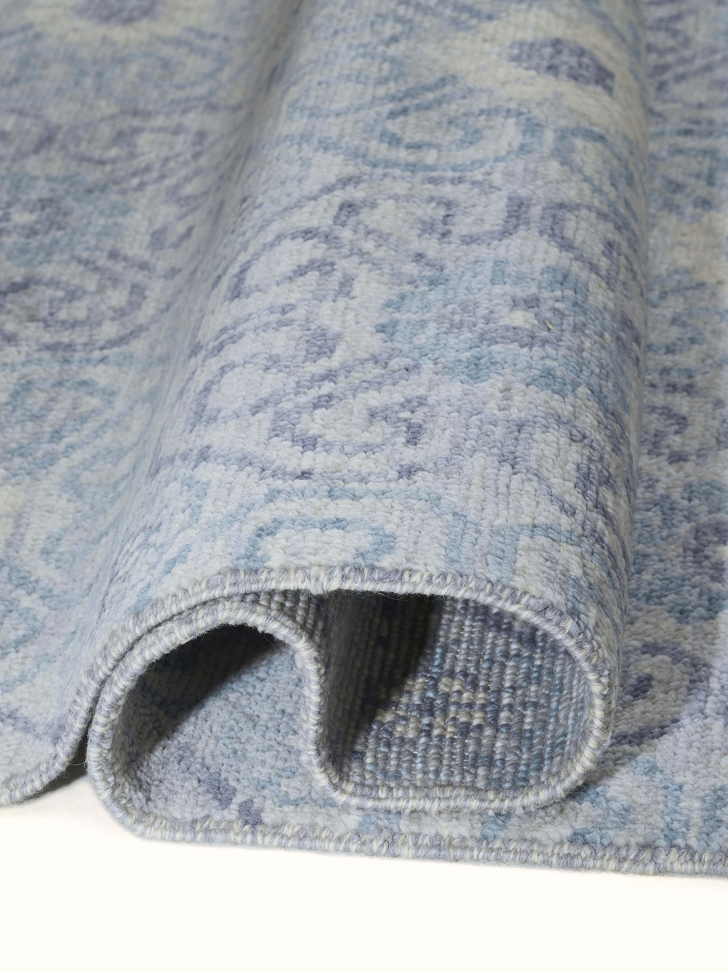 Detailed view of the Vintage Moroccan Grey Agra Wool Hand-Knotted Rug, emphasizing its craftsmanship and grey pattern.