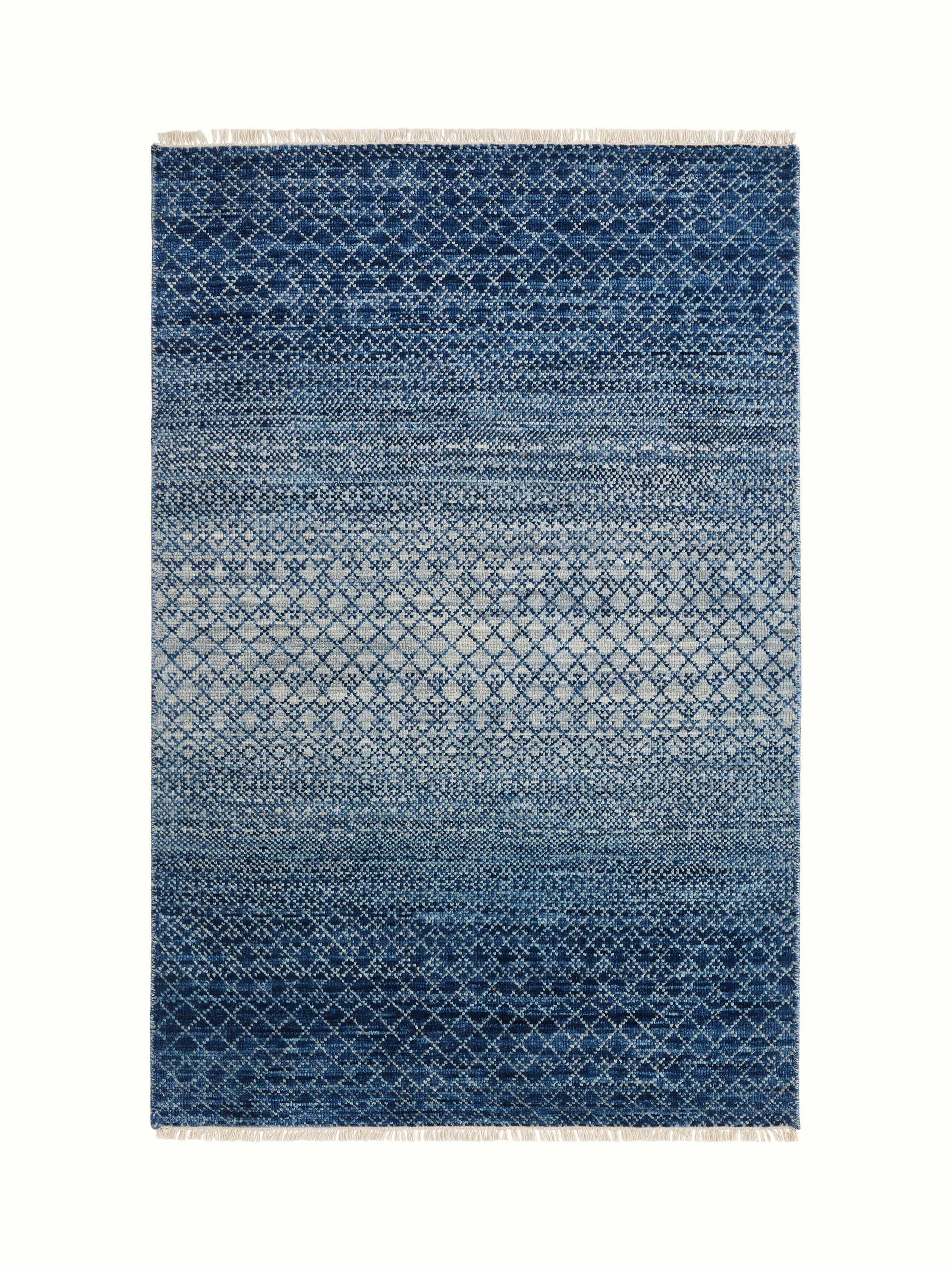 Ombre grass blue Agra wool hand-knotted rug showcasing its gradient design in blue tones.