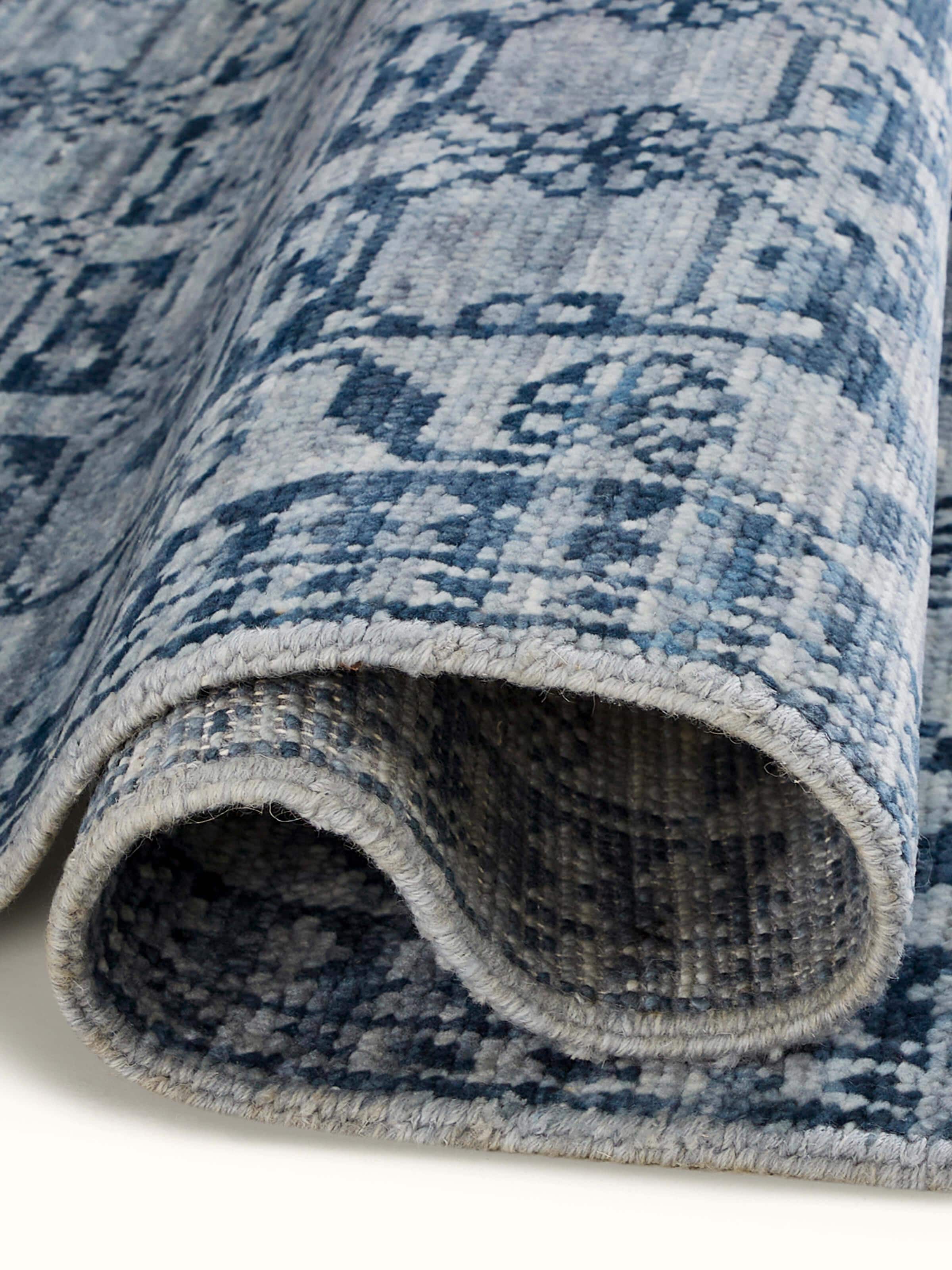 Side view of the Ziegler Traditional Blue Agra Wool Hand-Knotted Runner, capturing its length and design detail.