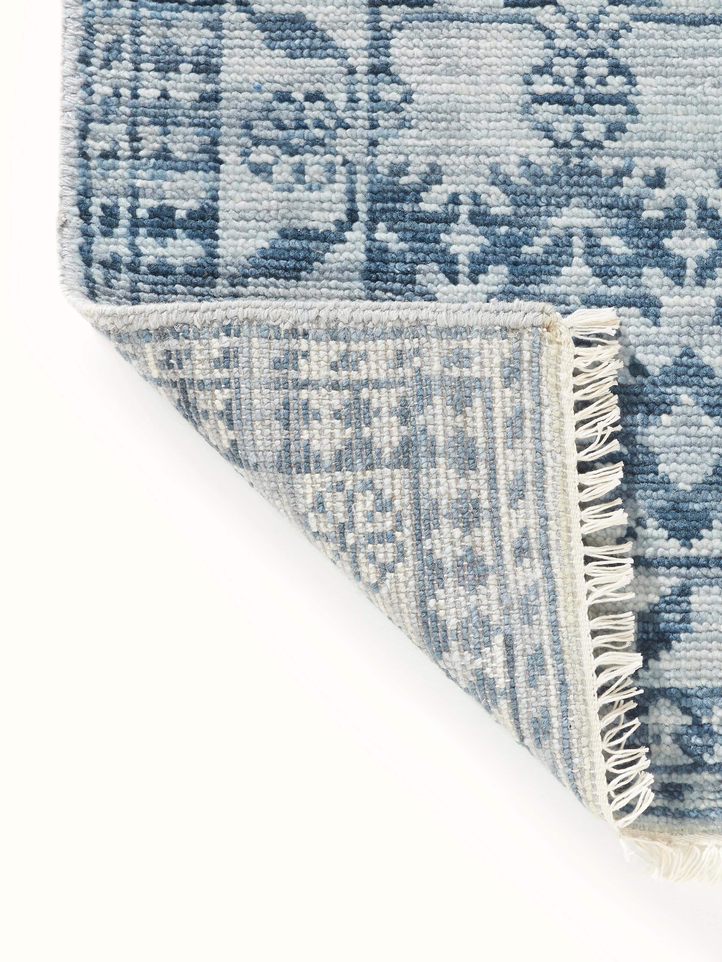 Detailed close-up of the Ziegler Traditional Blue Agra Wool Hand-Knotted Runner, showcasing the fine wool quality and traditional design elements.