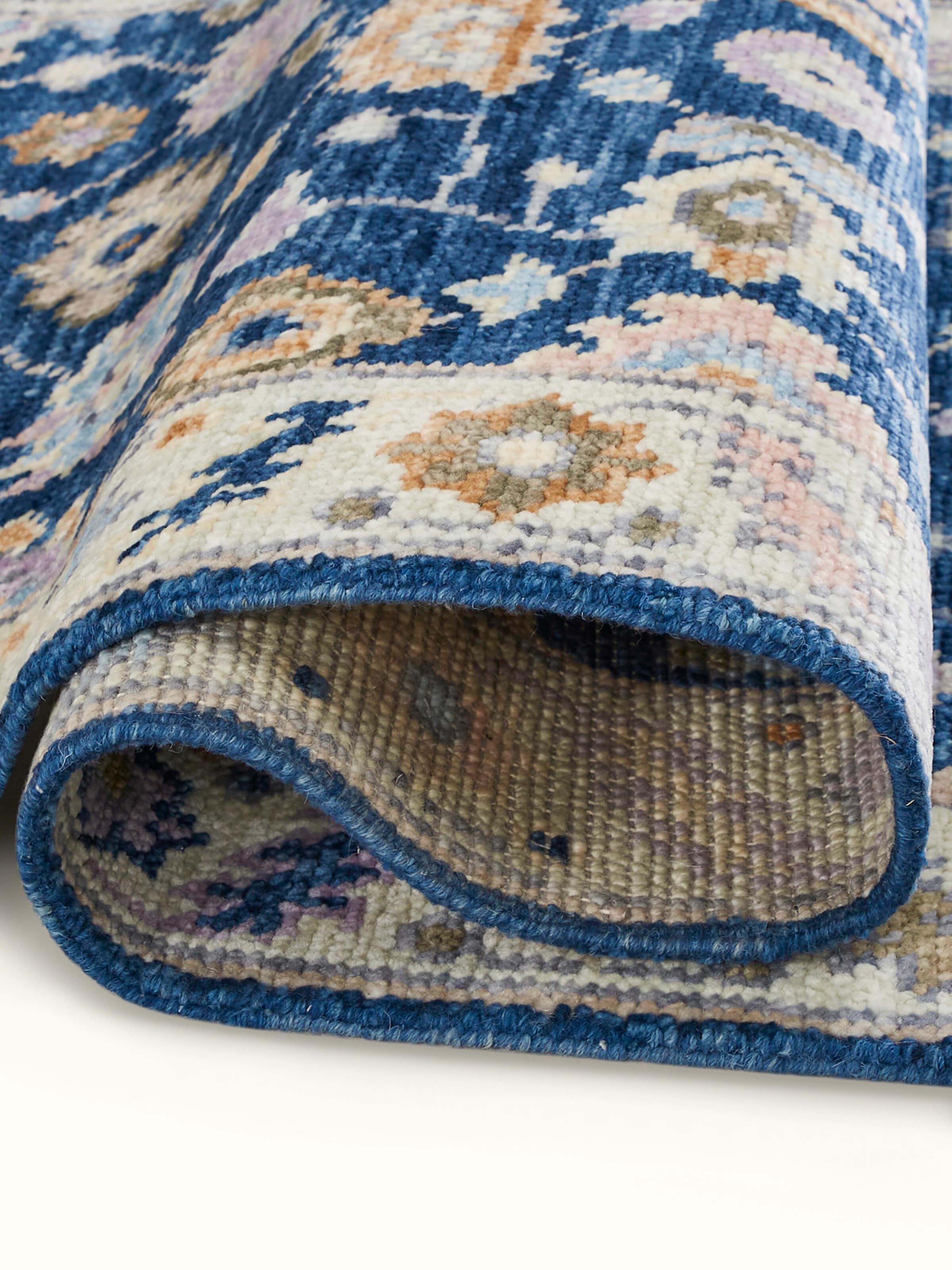 Close-up of Ziegler traditional blue chobi Agra wool hand-knotted runner highlighting intricate weaving details