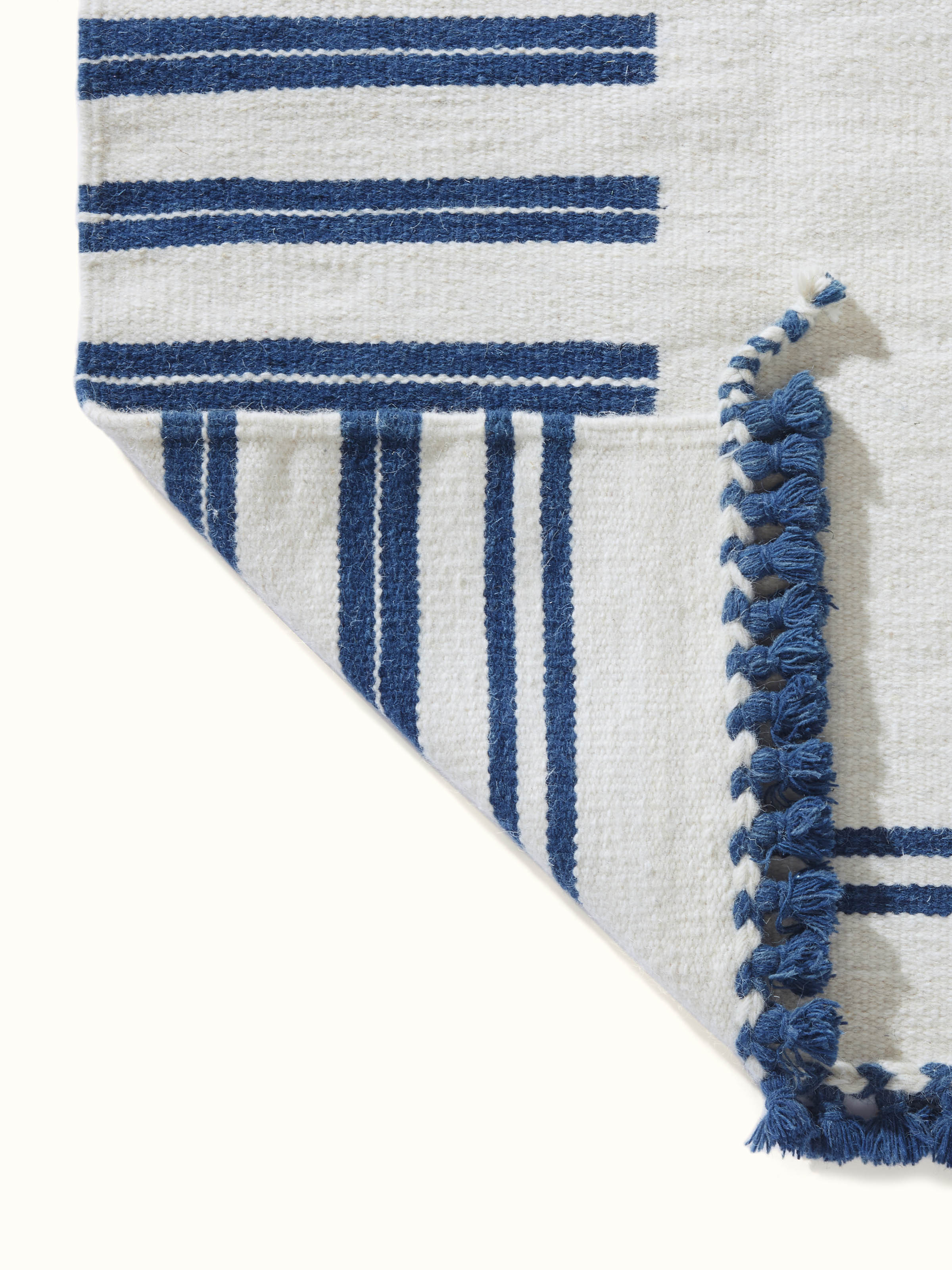 Geo border ivory blue Gujarat wool & cotton panja dhurrie kharad (4x6 ft) showing the full design and border pattern.