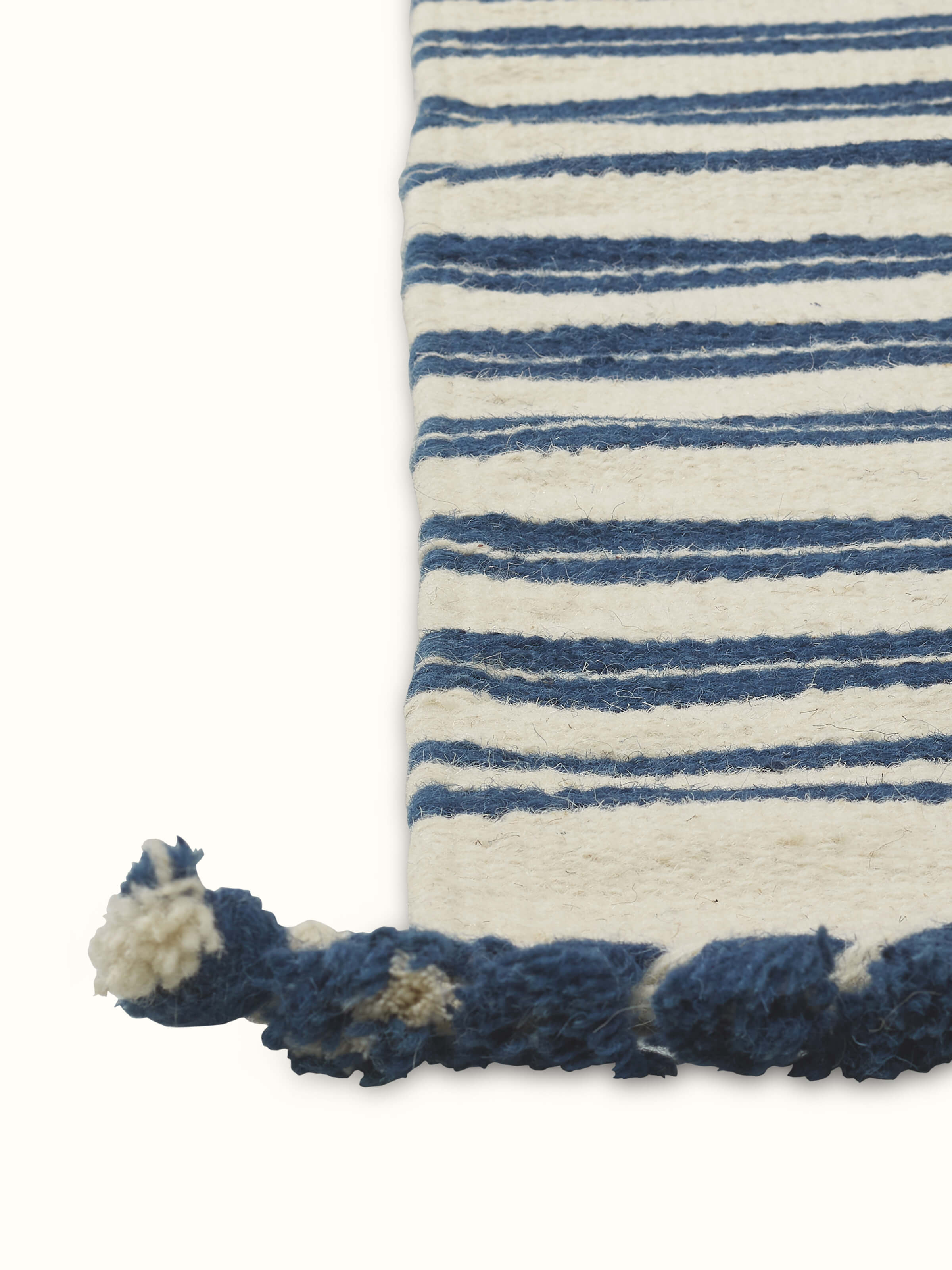 Overhead view of Geo Border Ivory Blue Gujarat Wool & Cotton Panja Dhurrie, emphasizing the full geometric design and color scheme.