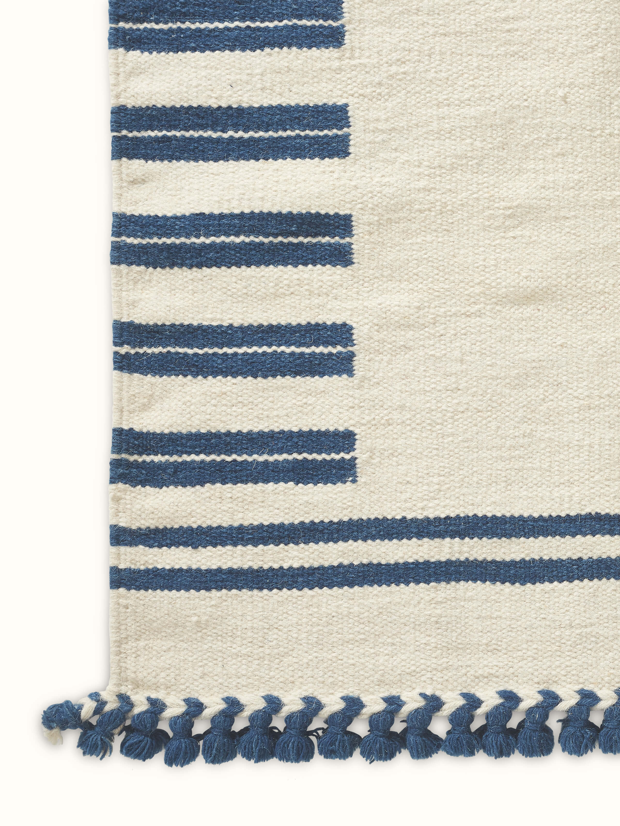 Detailed view of Geo Border Ivory Blue Gujarat Wool & Cotton Panja Dhurrie, focusing on the texture and color pattern.
