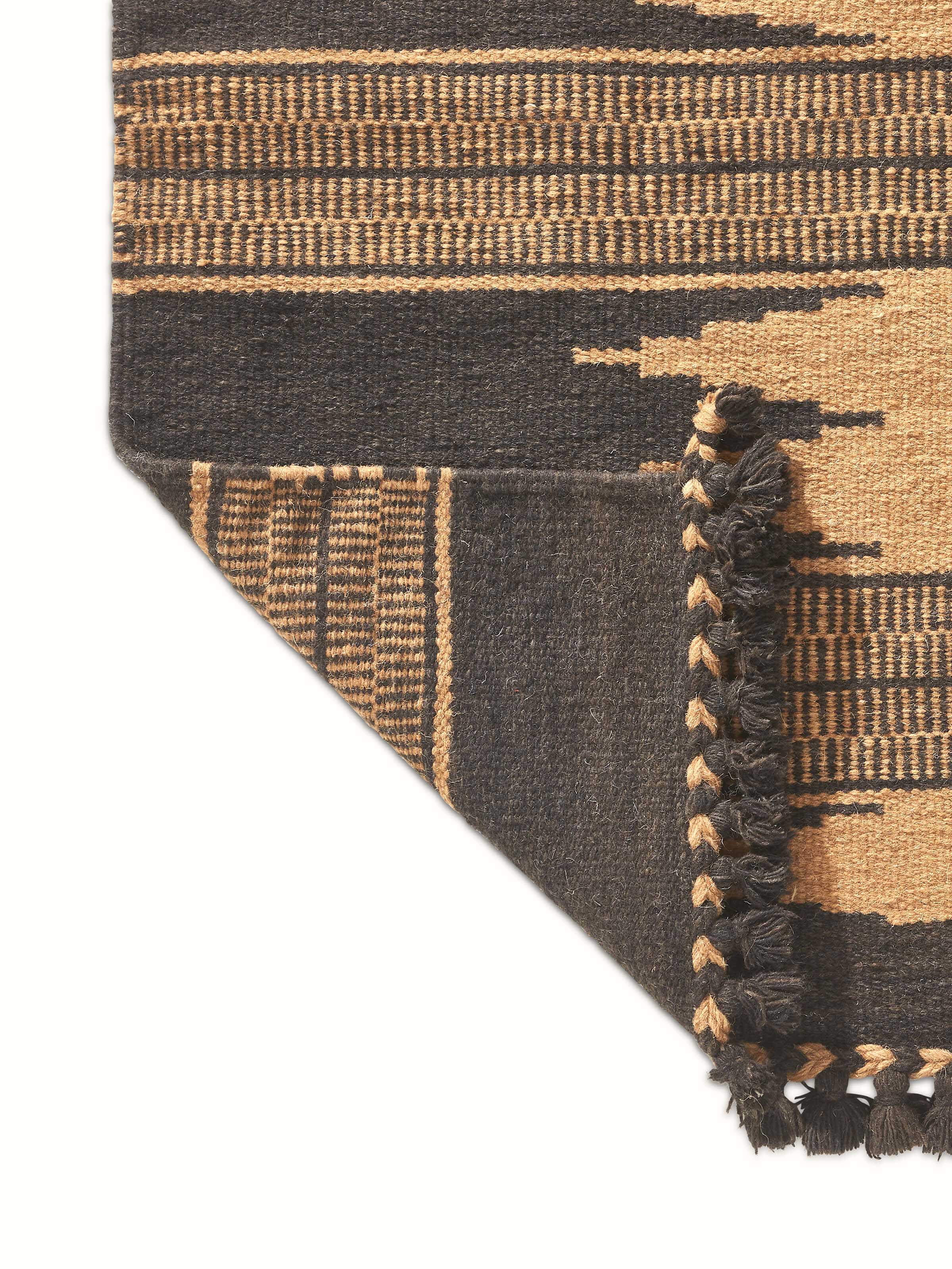 Artistic view of the Geo Diamonds dark brown Gujarat wool & cotton panja dhurrie kharad (3x5 ft)