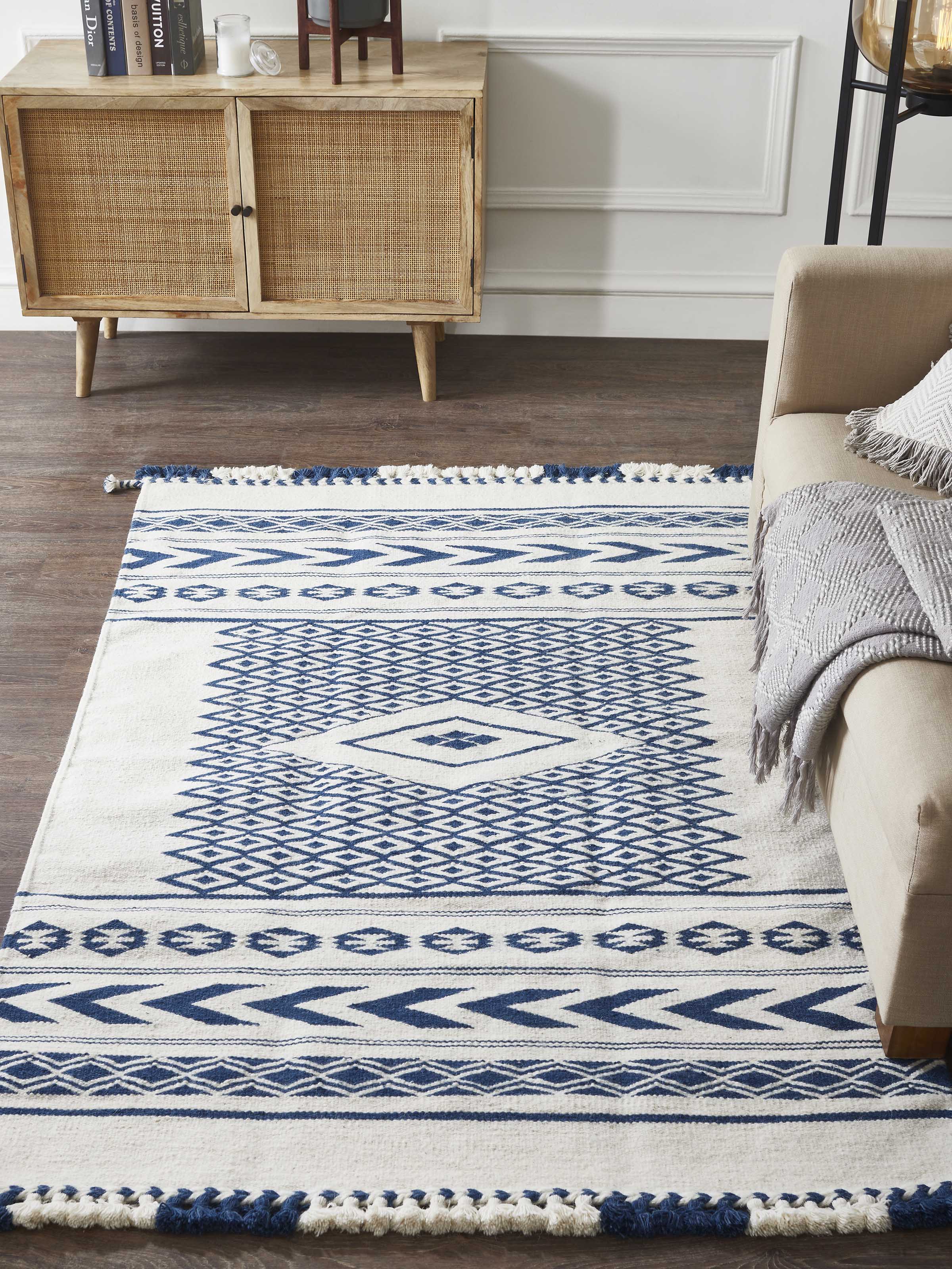 Close-up of Traditional Geo Ivory Indigo Gujarat Wool & Cotton Panja Dhurrie Kharad, showcasing the intricate pattern and texture.