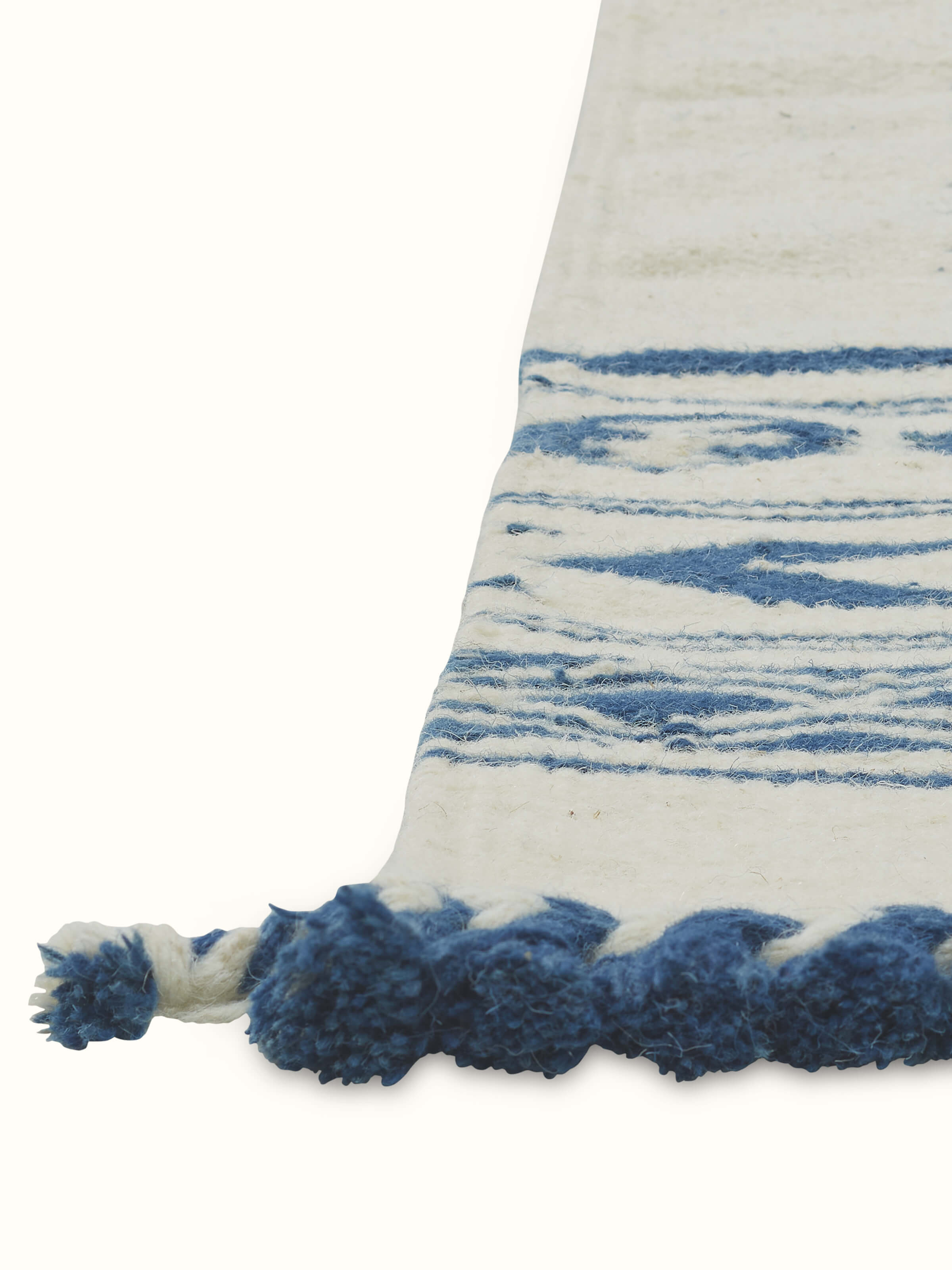 Perspective view of Traditional geo ivory indigo Gujarat wool & cotton panja dhurrie kharad (3x5 ft) showing the overall design and texture.