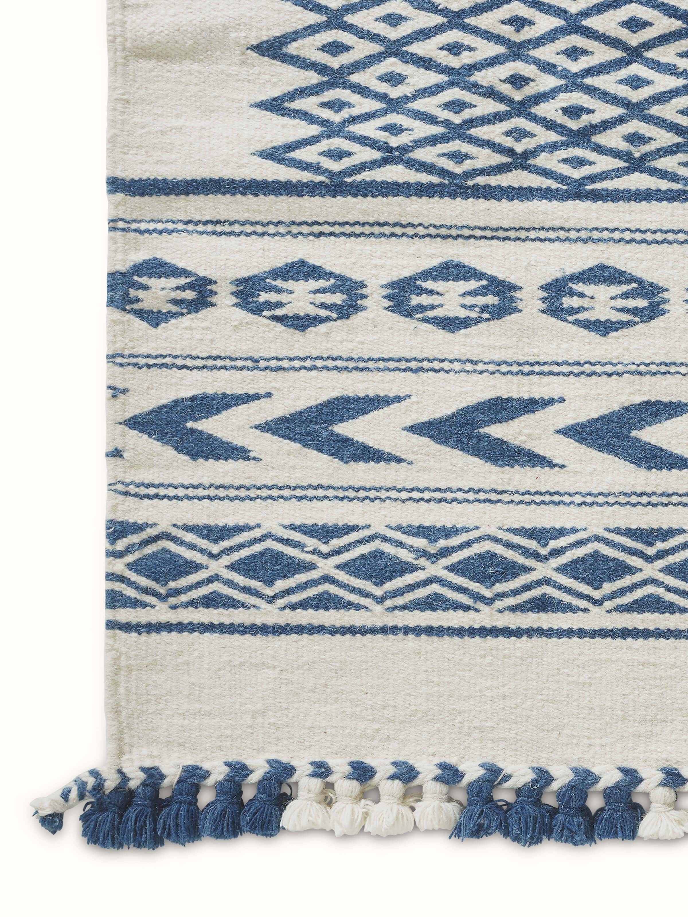 Detailed view of Traditional geo ivory indigo Gujarat wool & cotton panja dhurrie kharad (3x5 ft) emphasizing the geometric design and rich colors.