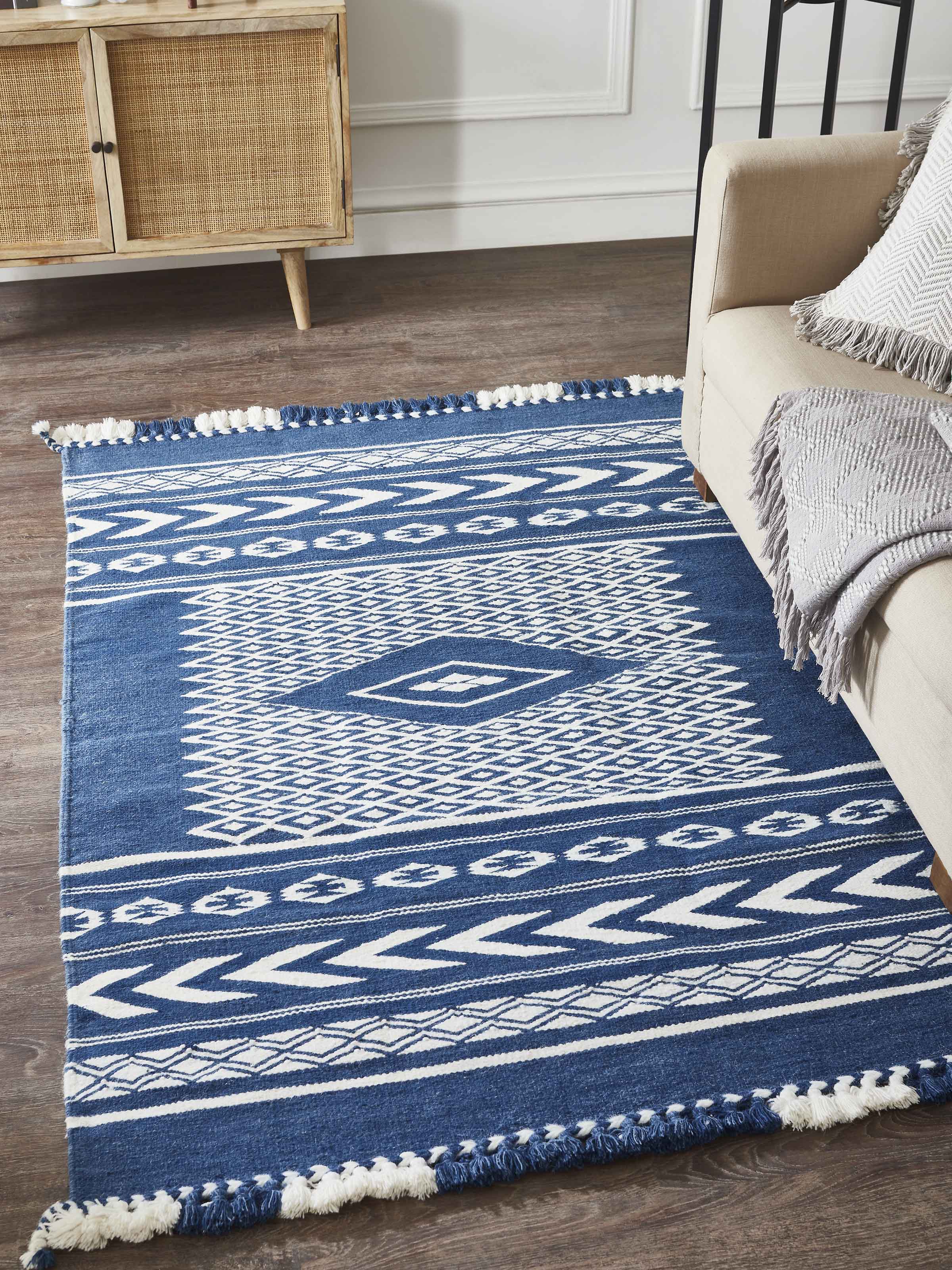 Close-up of Traditional Geo Indigo Ivory Gujarat wool & cotton panja dhurrie kharad (4x6 ft), showing the detailed geometric design and fabric texture.