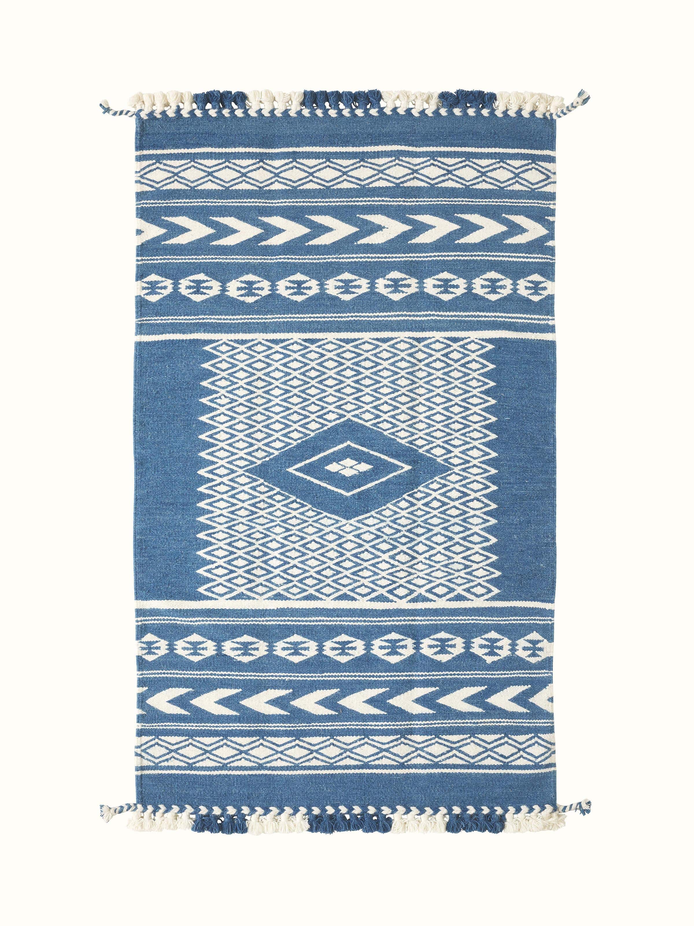 Top view of Traditional Geo indigo ivory Gujarat wool & cotton panja dhurrie kharad (3x5 ft) showcasing its geometric pattern and color contrast.