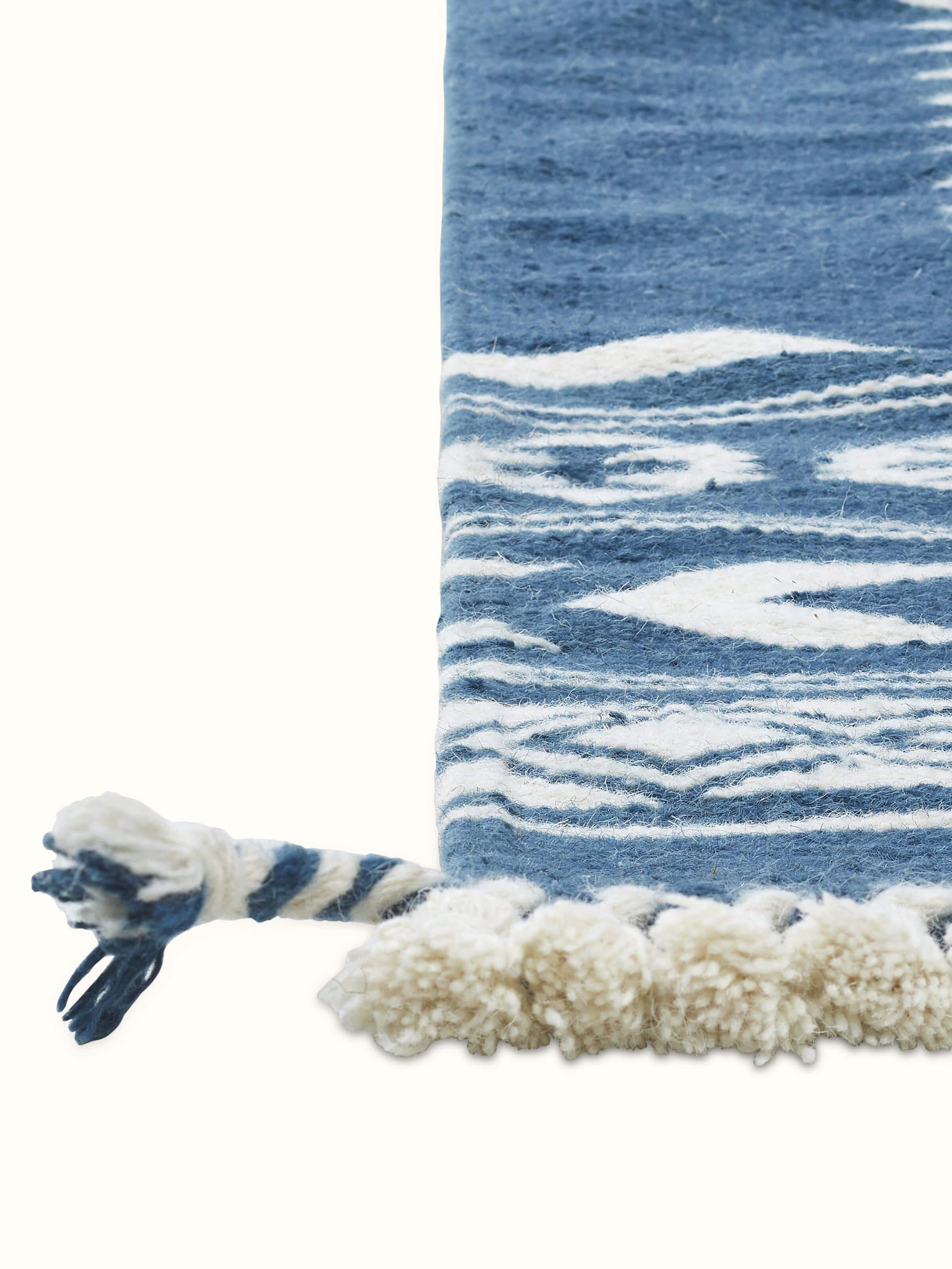 Close-up of Traditional Geo indigo ivory Gujarat wool & cotton panja dhurrie kharad (3x5 ft) highlighting the detailed weaving and patterns.