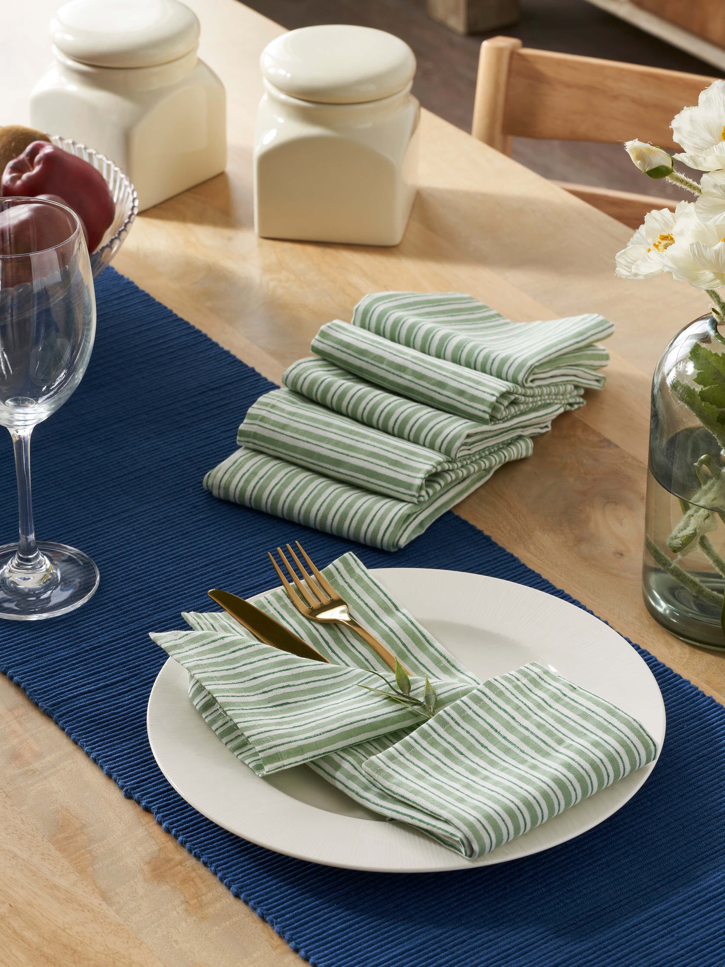 Close-up of Anika Green Stripe Cotton Linen Sanganeri Block Printed Dinner Napkins, highlighting the detailed green stripe and block print.
