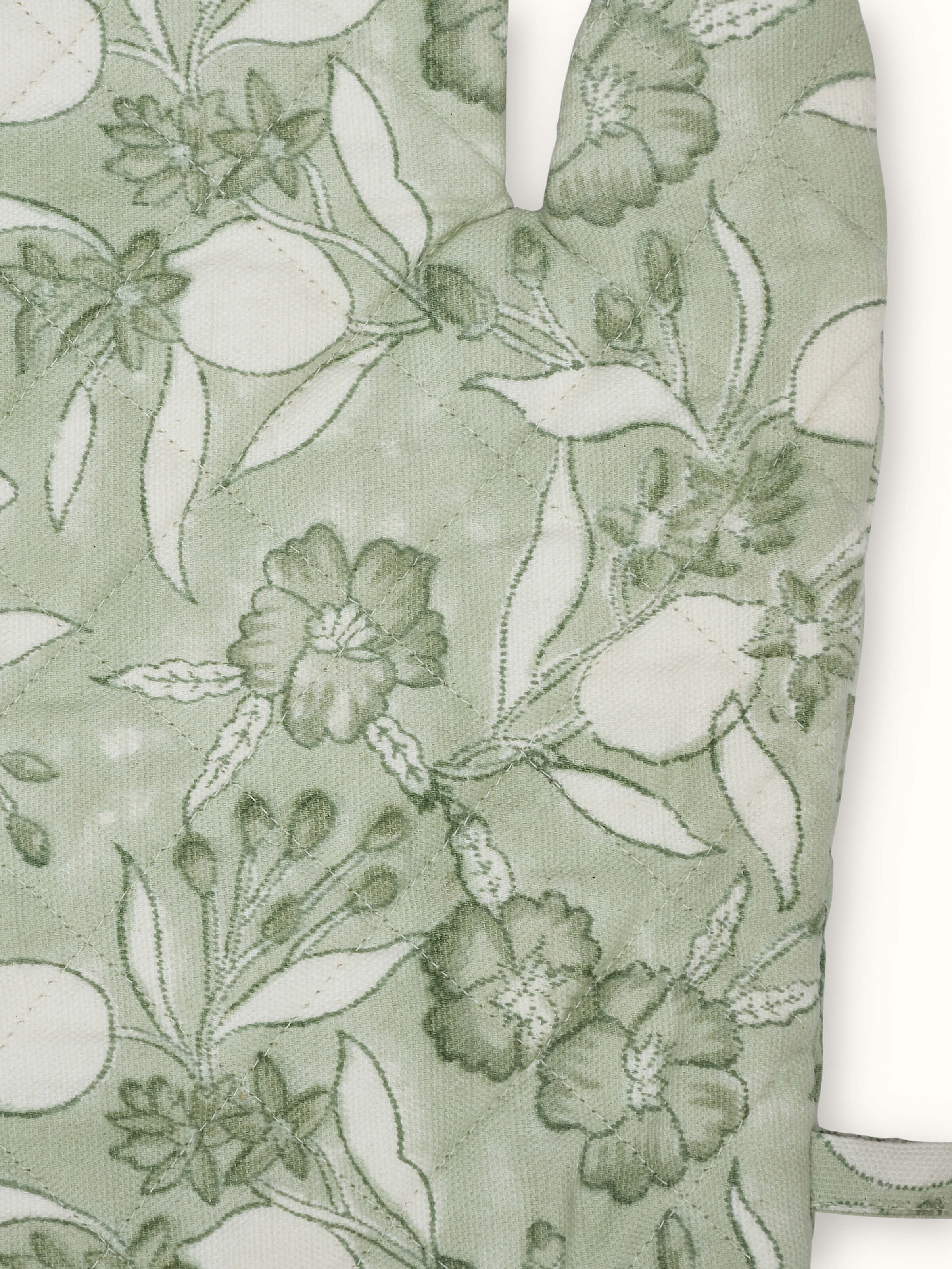 Detailed view of green floral cotton Sanganeri block printed oven mitts highlighting the quality and design.