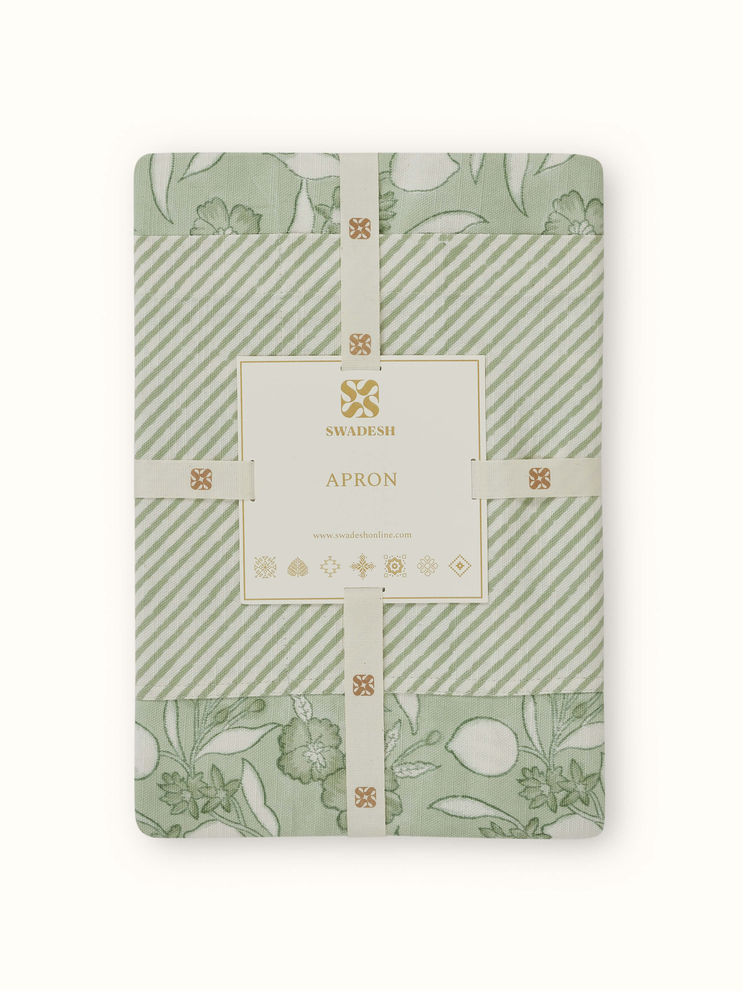 Green floral cotton Sanganeri block printed apron worn to showcase its fit and design.