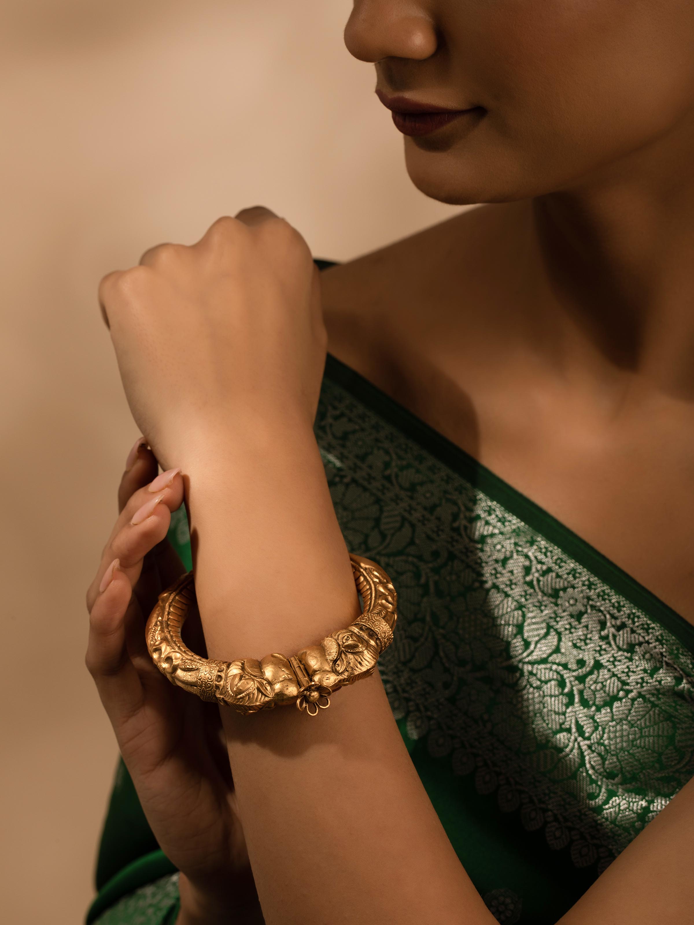 Side view of Silversmithing Kada showcasing its detailed craftsmanship and sleek silver structure