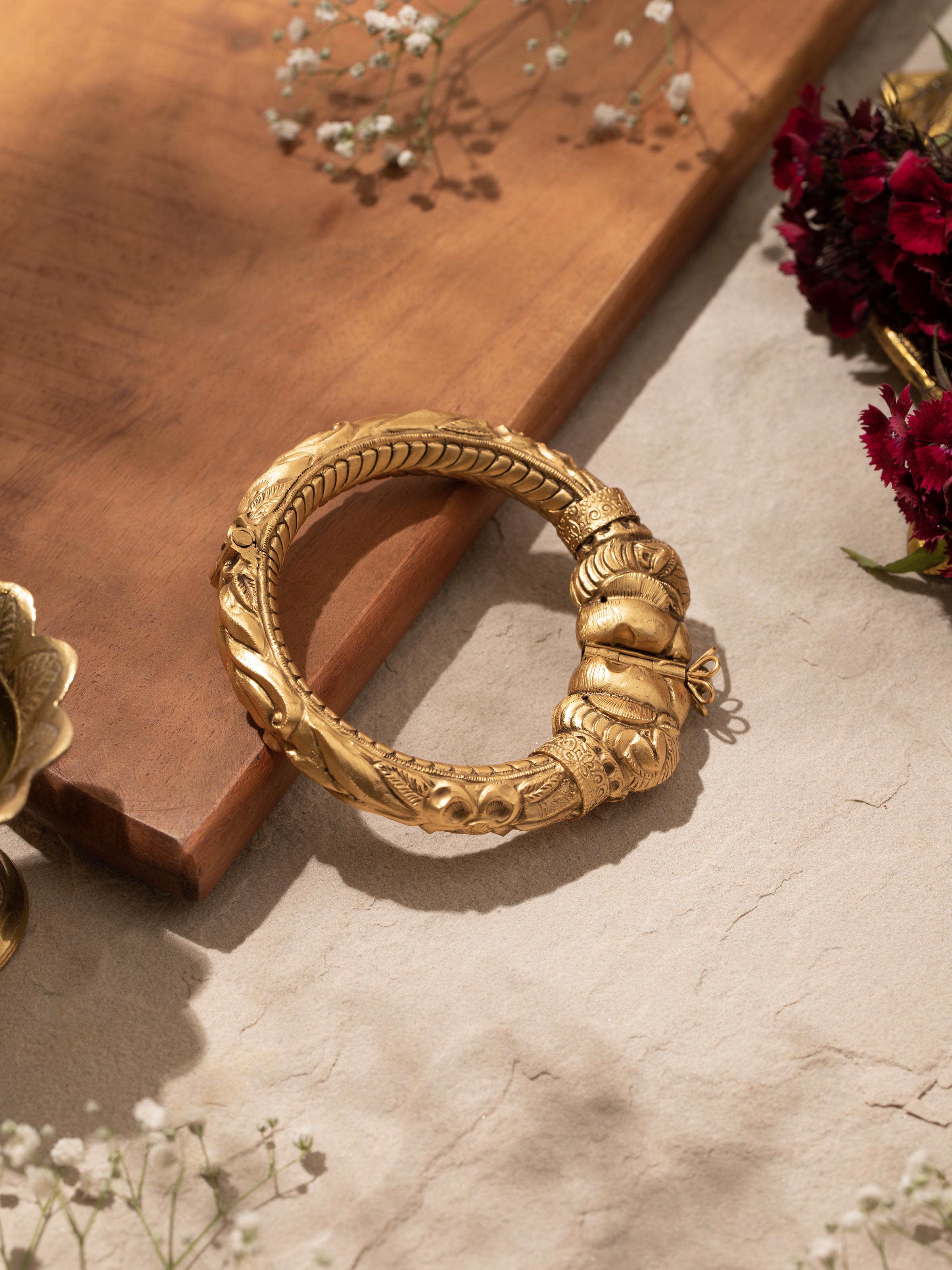 Angled view of Silversmithing Kada showcasing its elegant design and polished surface