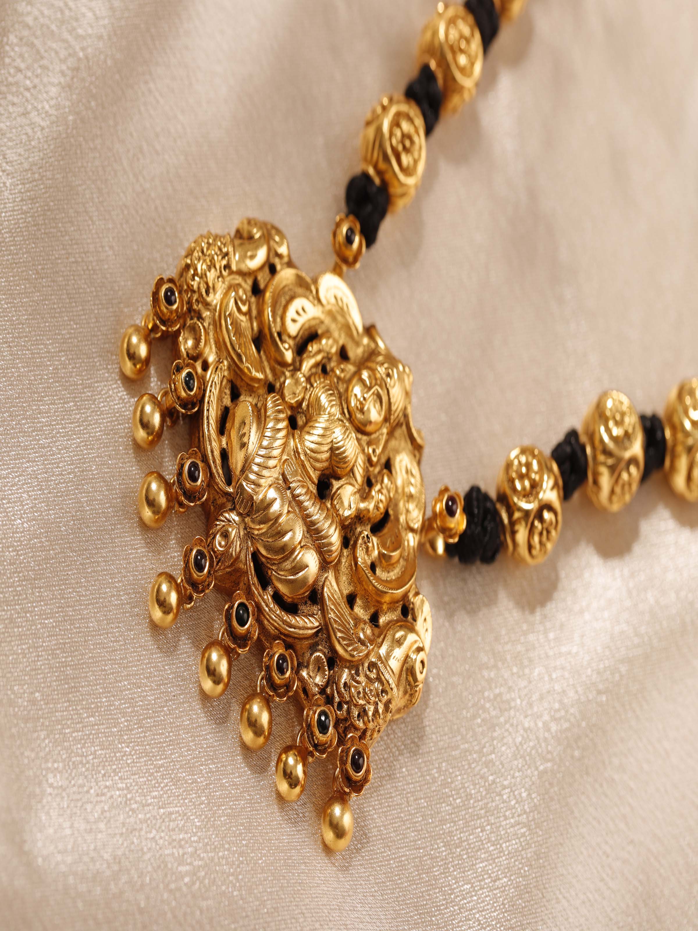 Angled view of Silversmithing Long Necklace emphasizing its refined design and elegant drape