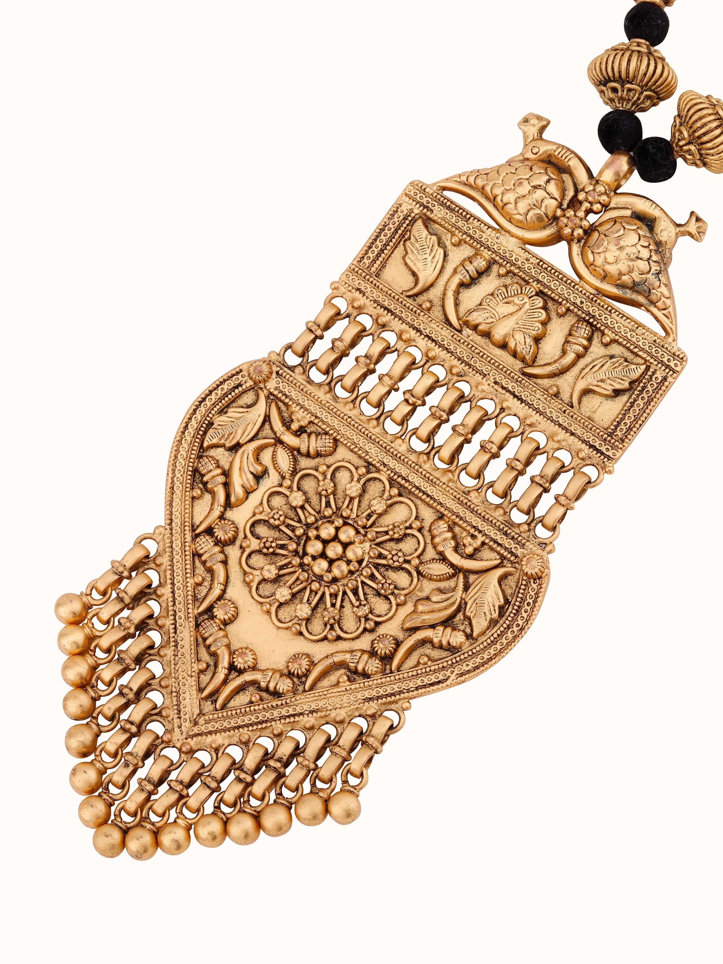 Angled view of silversmithing long necklace highlighting its detailed silverwork.