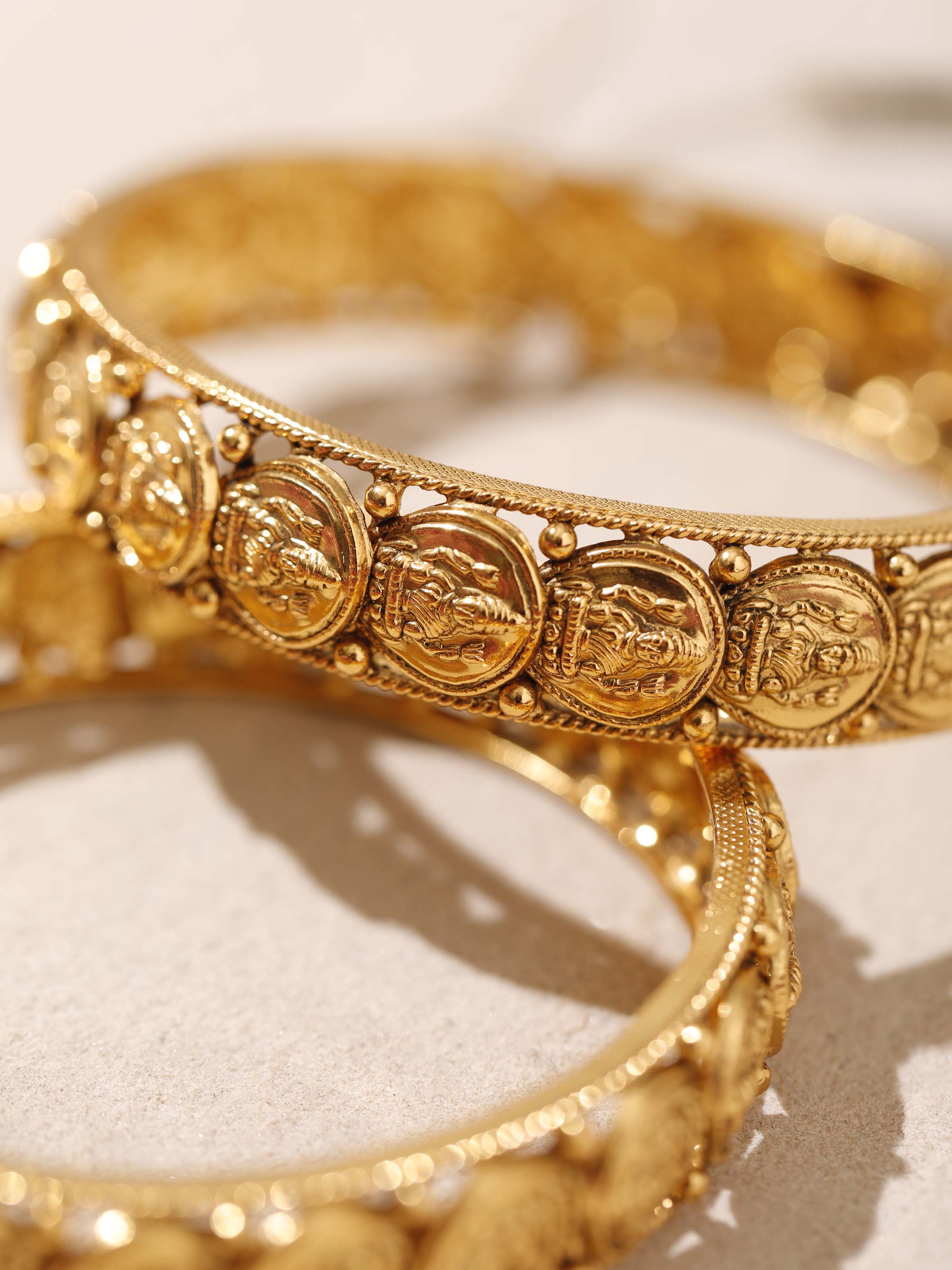 Angled view of Silversmithing Bangles (2 pcs) highlighting the refined bangle structure and smooth surface