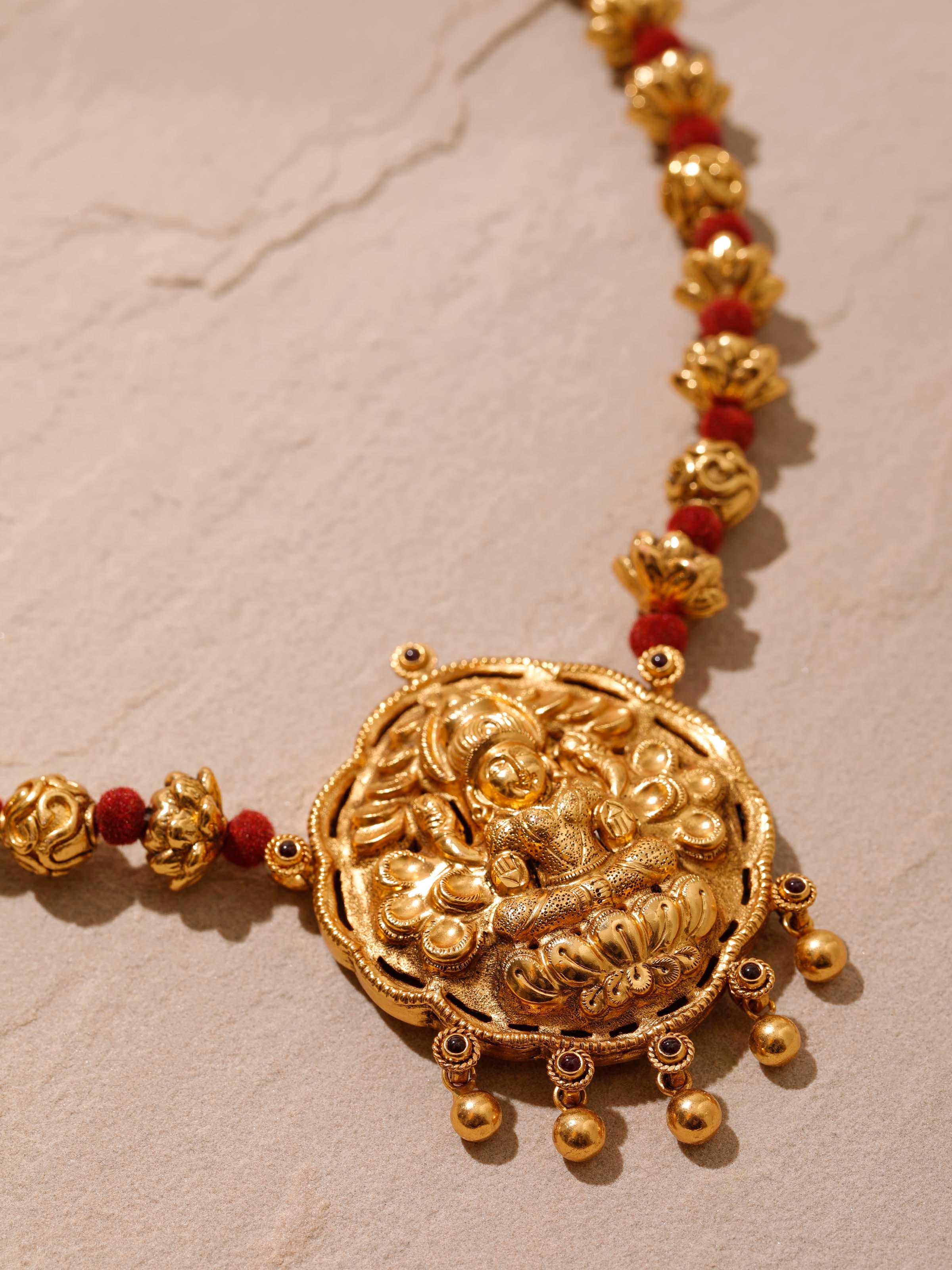 Close-up of Silversmithing Long Necklace focusing on the fine silver detailing and intricate design
