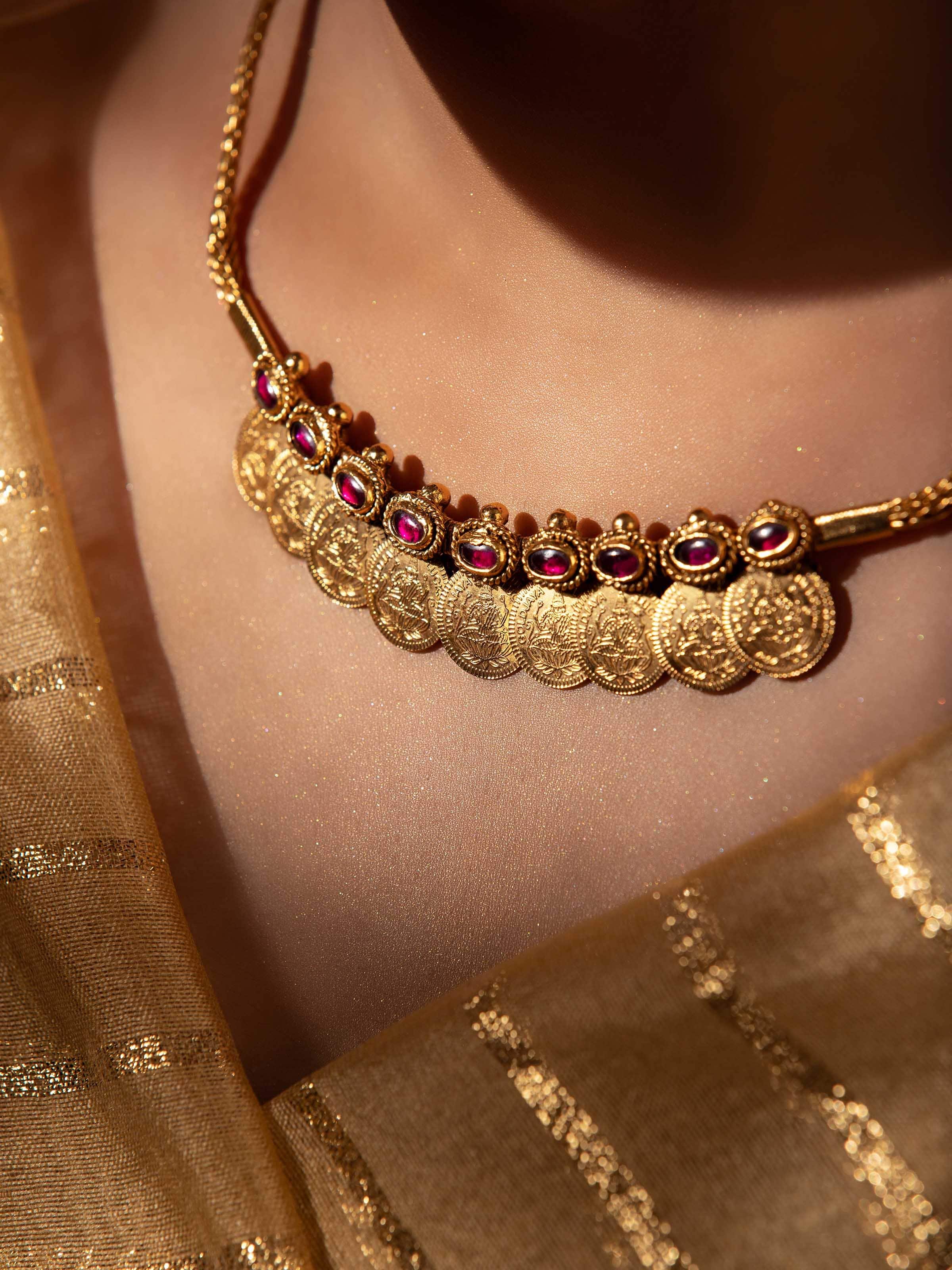 Close-up view of silversmithing collar necklace emphasizing the intricate silverwork and high-quality finish.