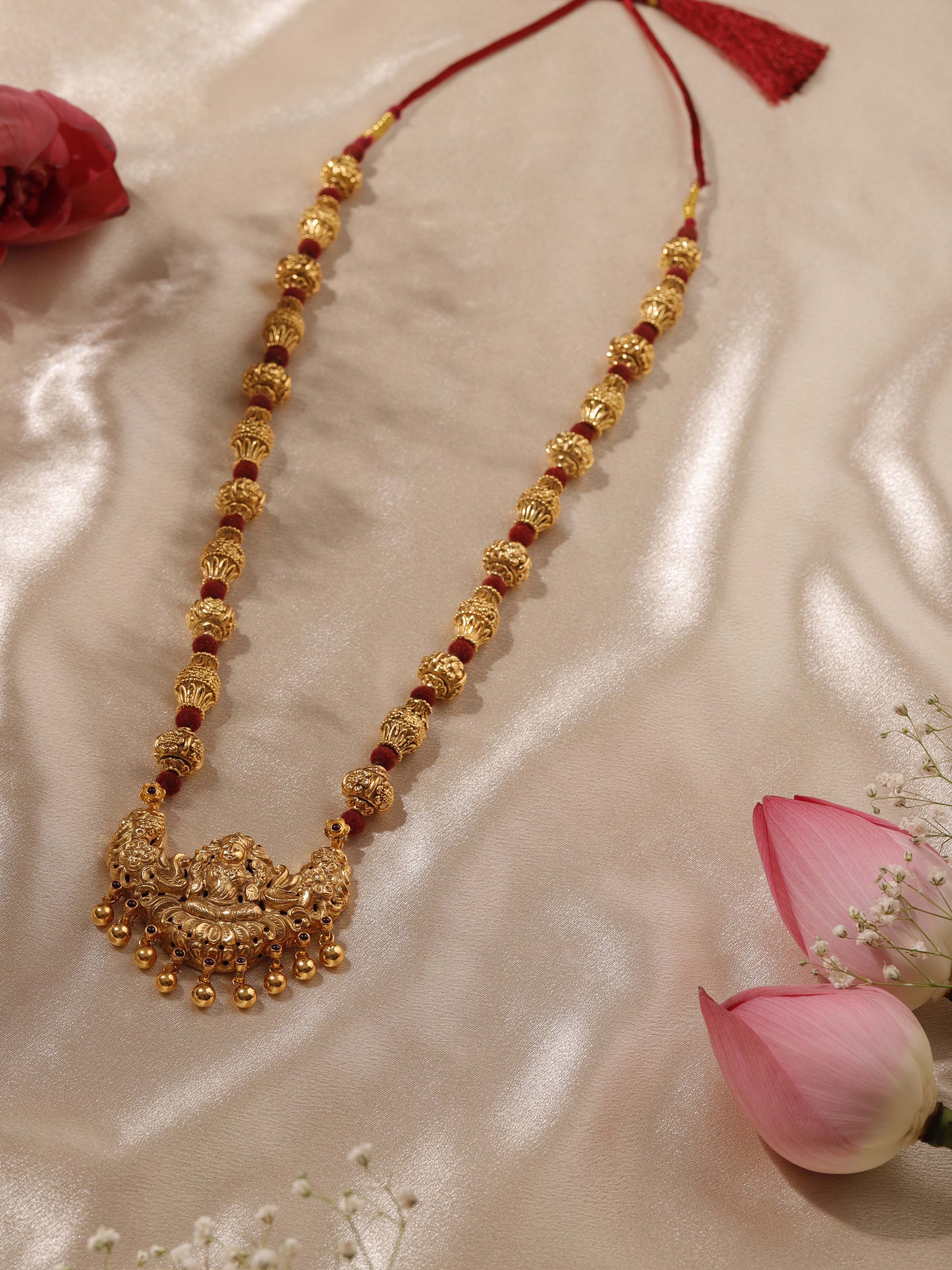 Detailed view of Silversmithing Long Necklace emphasizing the necklace’s smooth surface and design