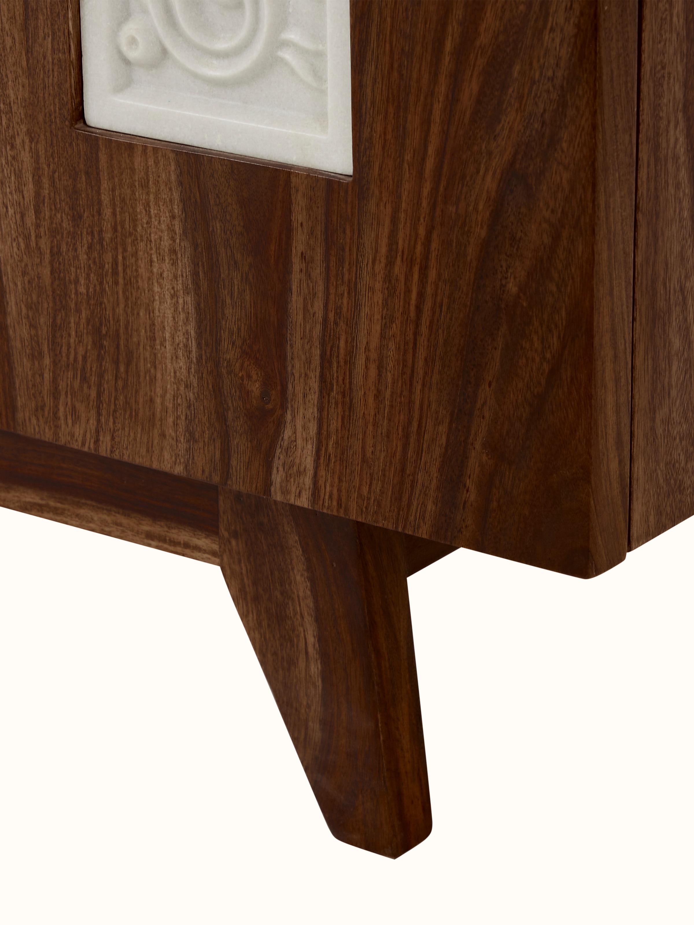 Detailed side view of the carved Sheesham wood sideboard, focusing on the elegant wood carving and marble top.