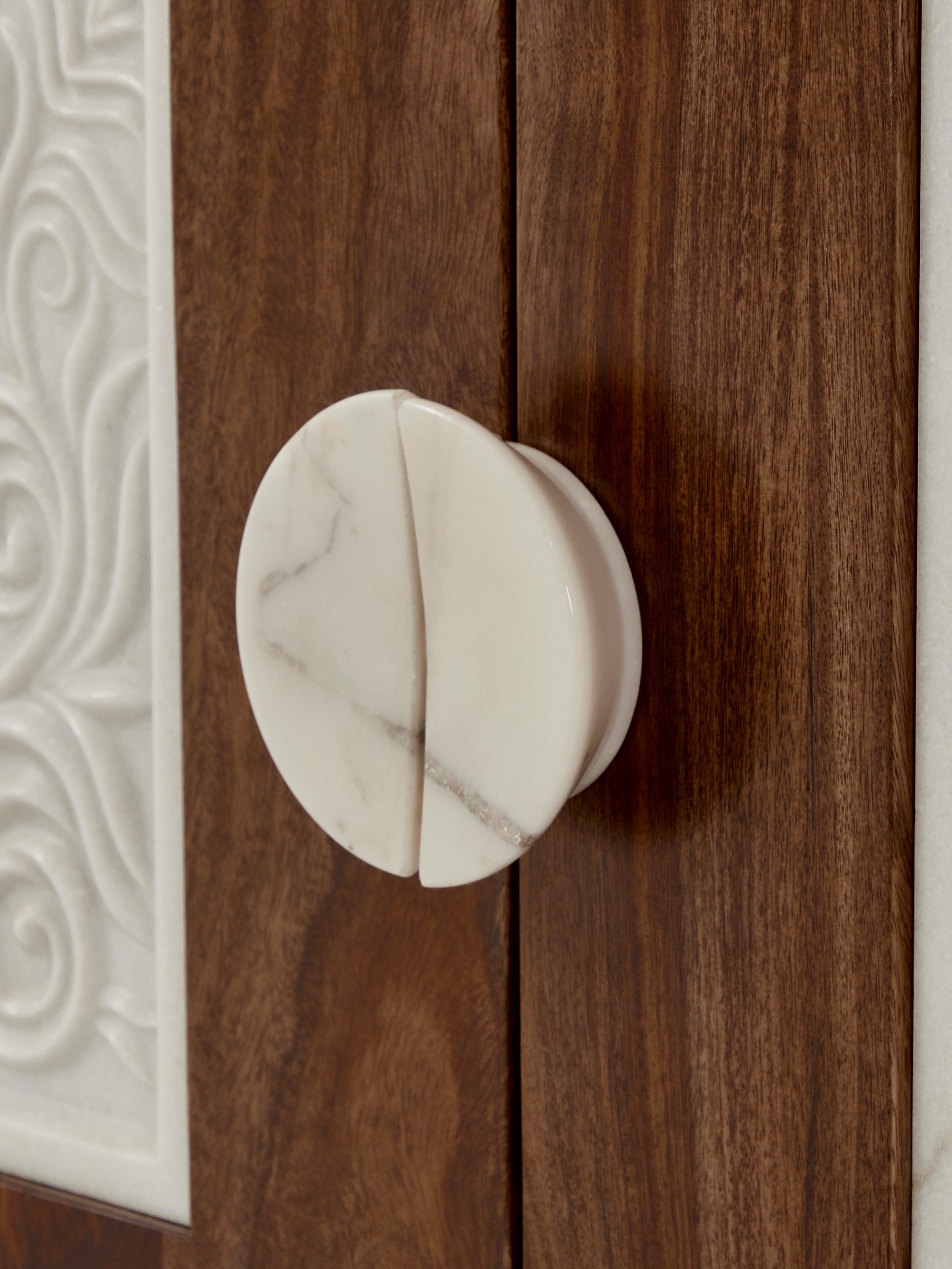 Top view of the marble surface on the carved Sheesham wood sideboard, highlighting the smooth marble and detailed carvings.