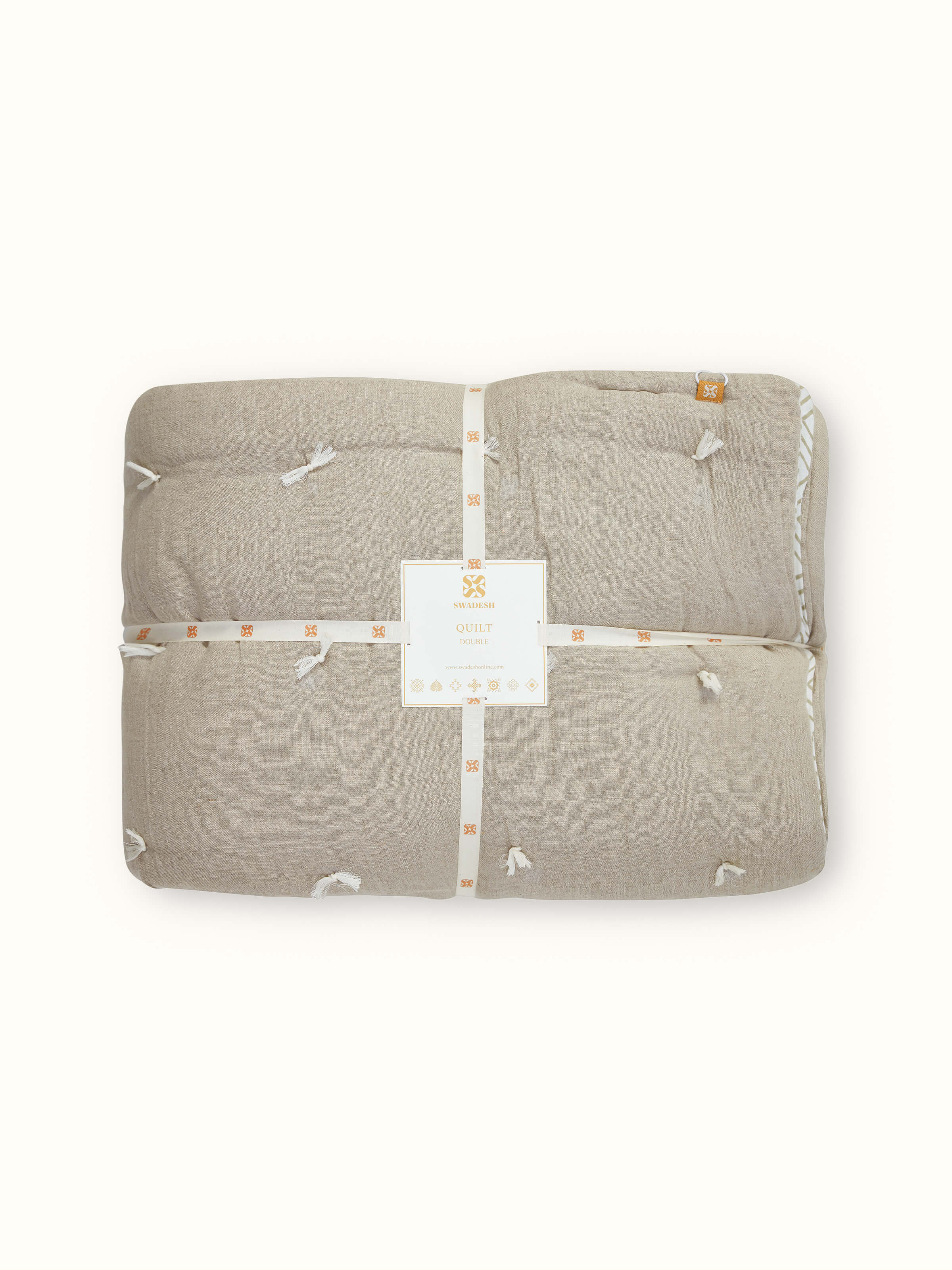 Detailed view of Anuthi Beige Solid Linen Razai Embroidered Double Quilt, focusing on the intricate embroidery and fabric quality.