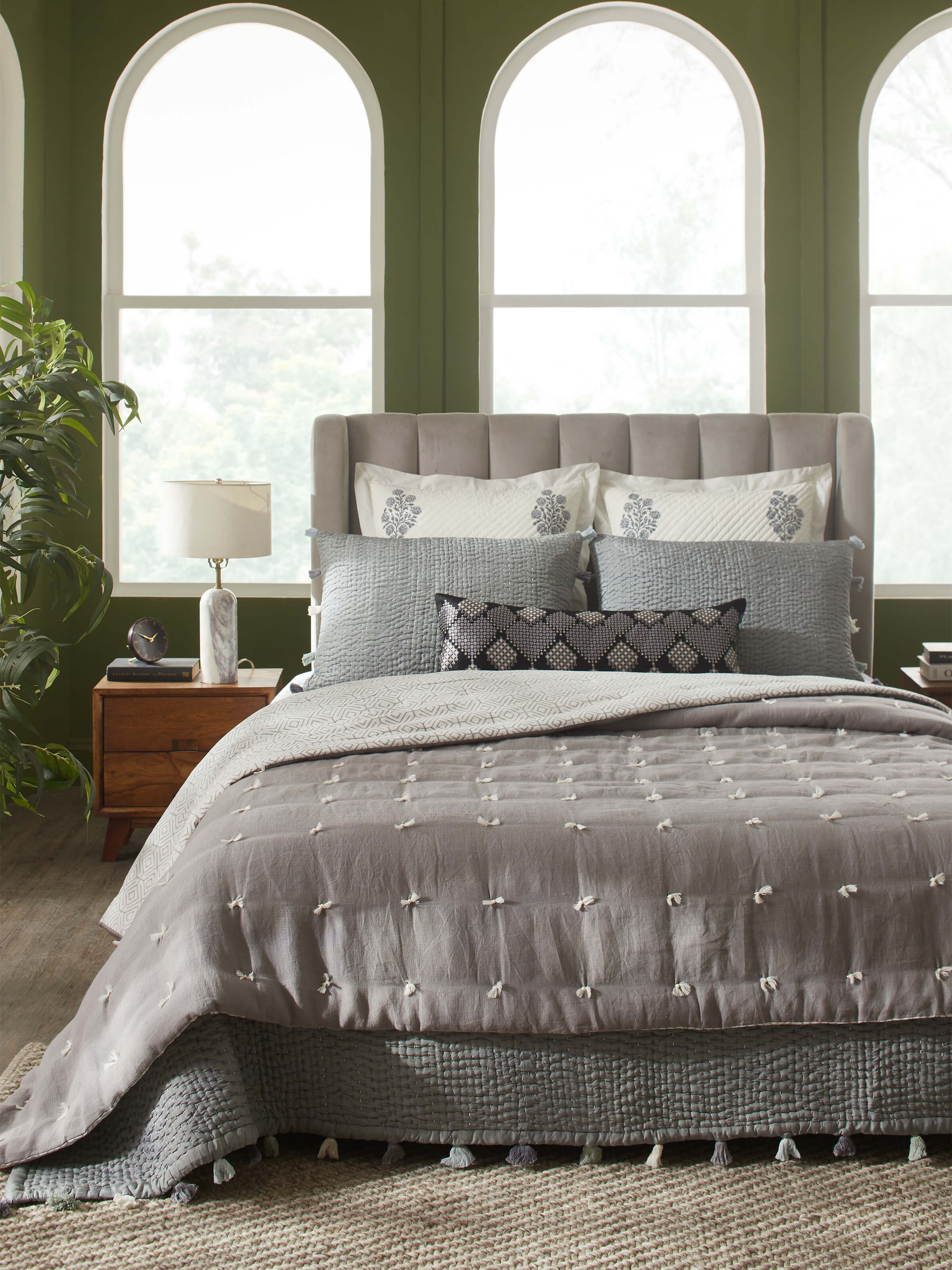 Close-up of Anuthi grey solid linen razai embroidered double quilt showcasing the fine embroidery details