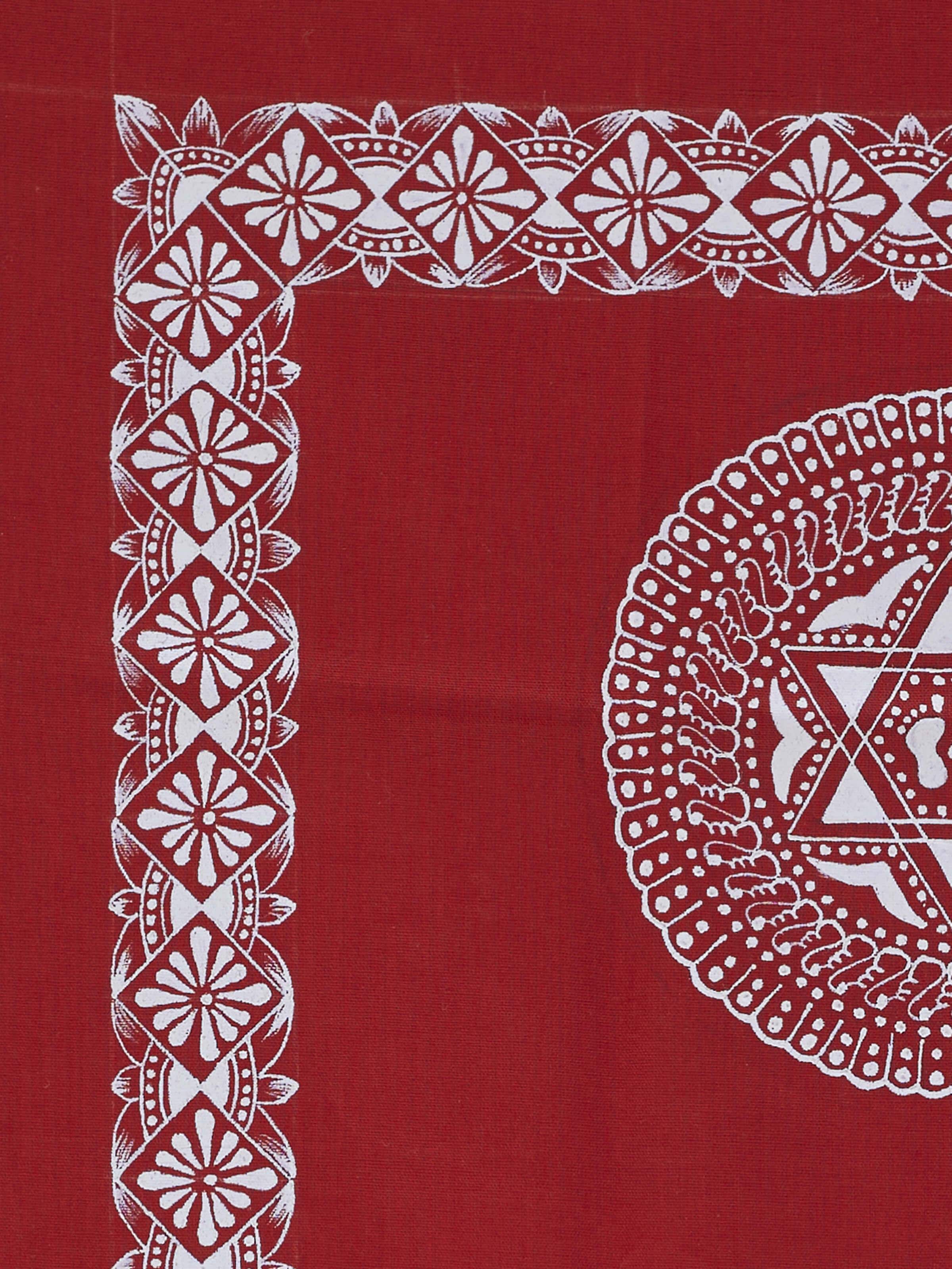 Side view of Aipan Saraswati Chowki painting, showcasing the depth and texture of the traditional artwork