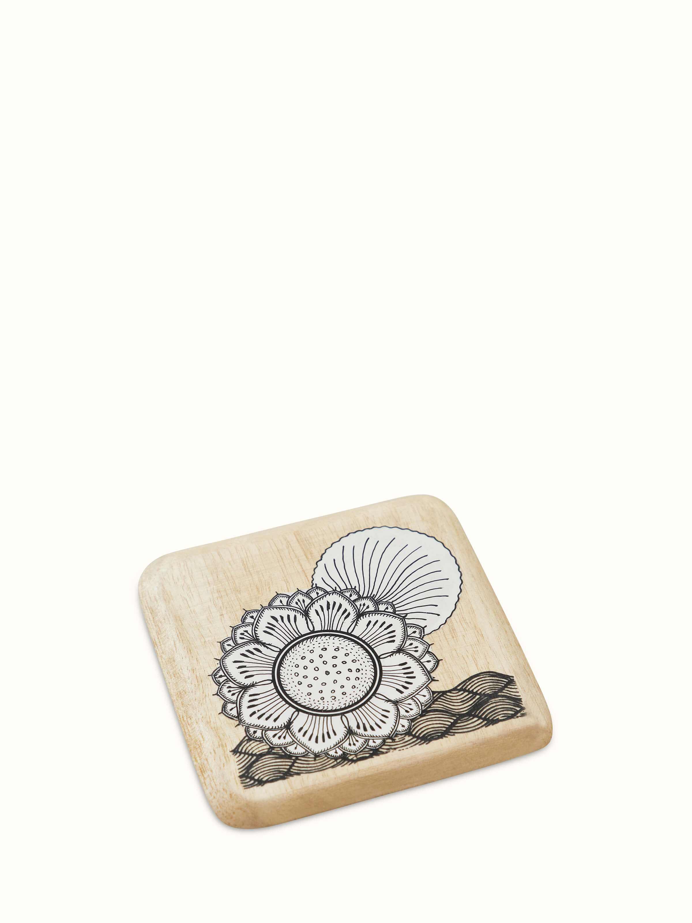 Detailed view of Carved Gamhar Wood Coasters in White & Black (4 pcs) highlighting texture