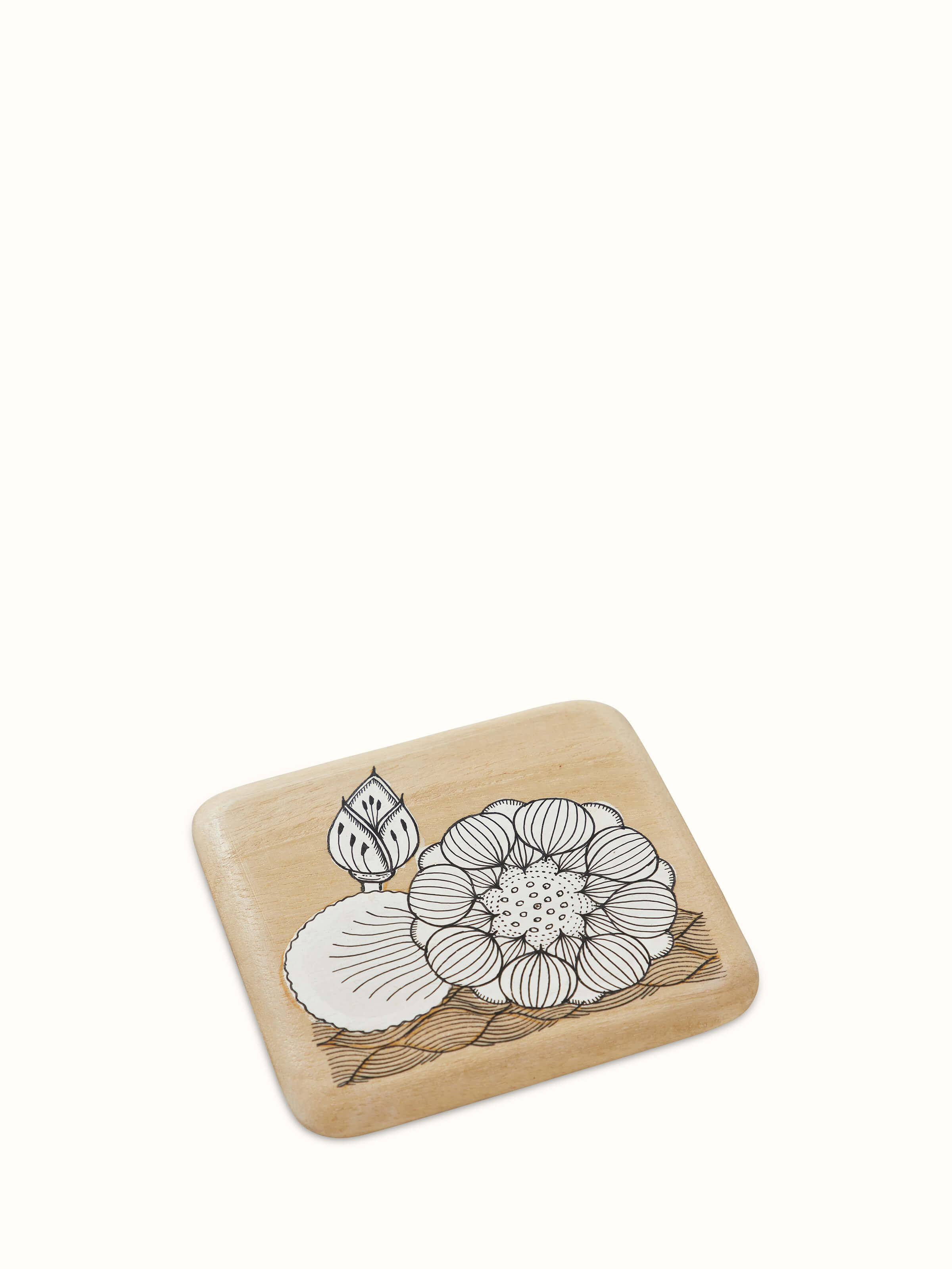 Close-up view of Carved Gamhar Wood Coasters in White & Black (4 pcs) showing craftsmanship