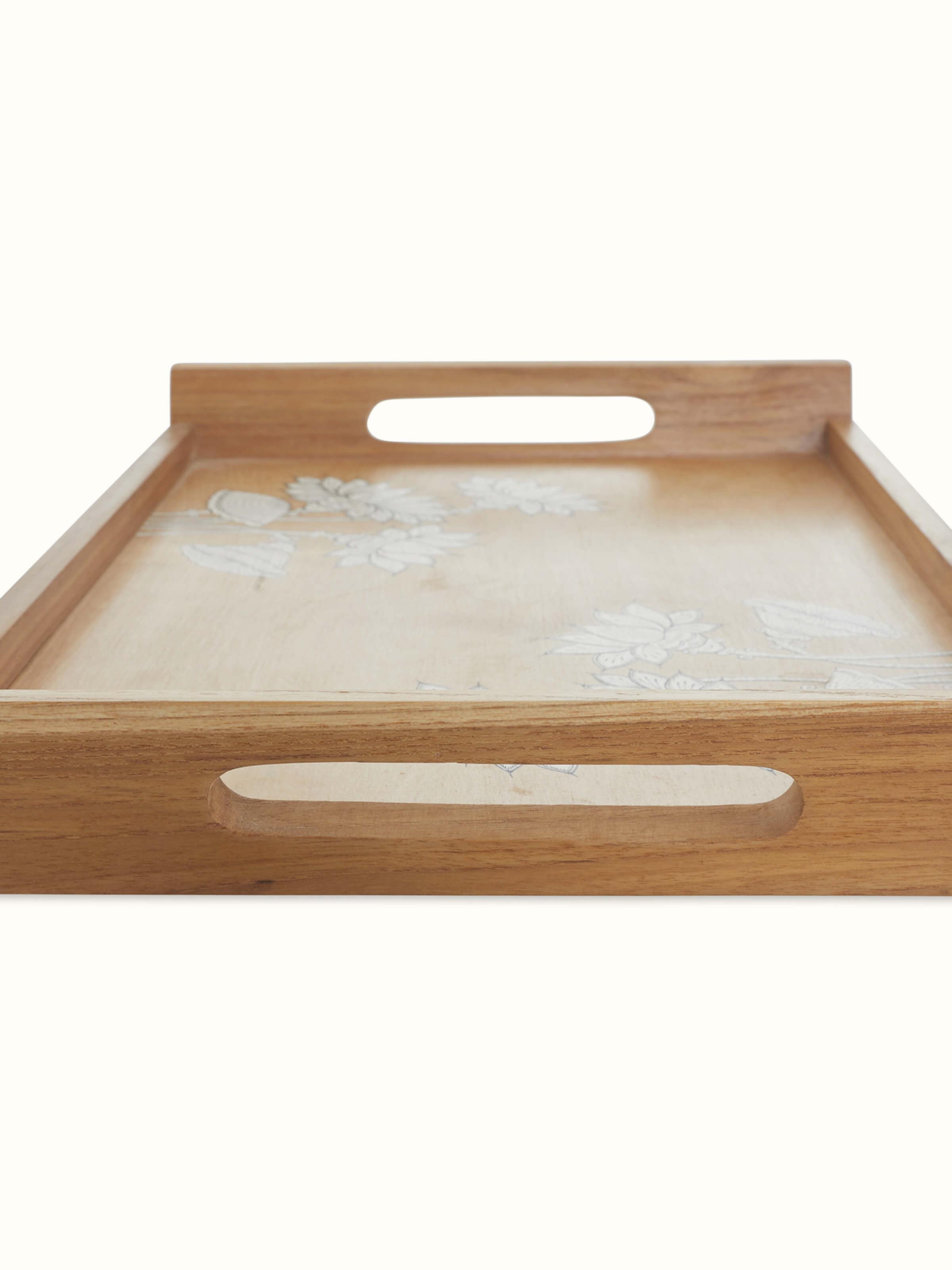 Top view of Carved teak wood trays in brown (2 pcs) showcasing the detailed craftsmanship and design