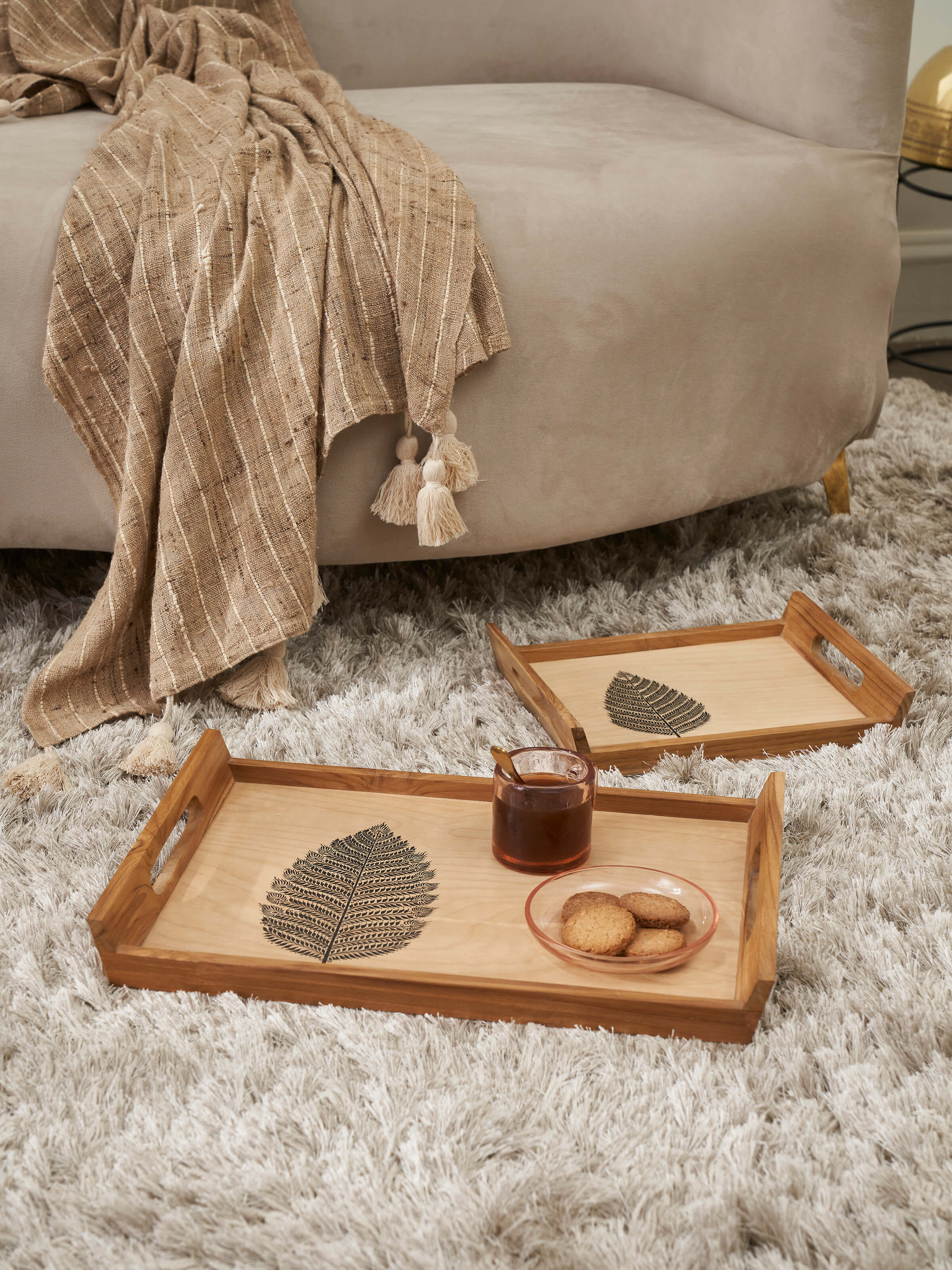 Side view of Carved Teak Wood Trays in Beige (2 pcs)
