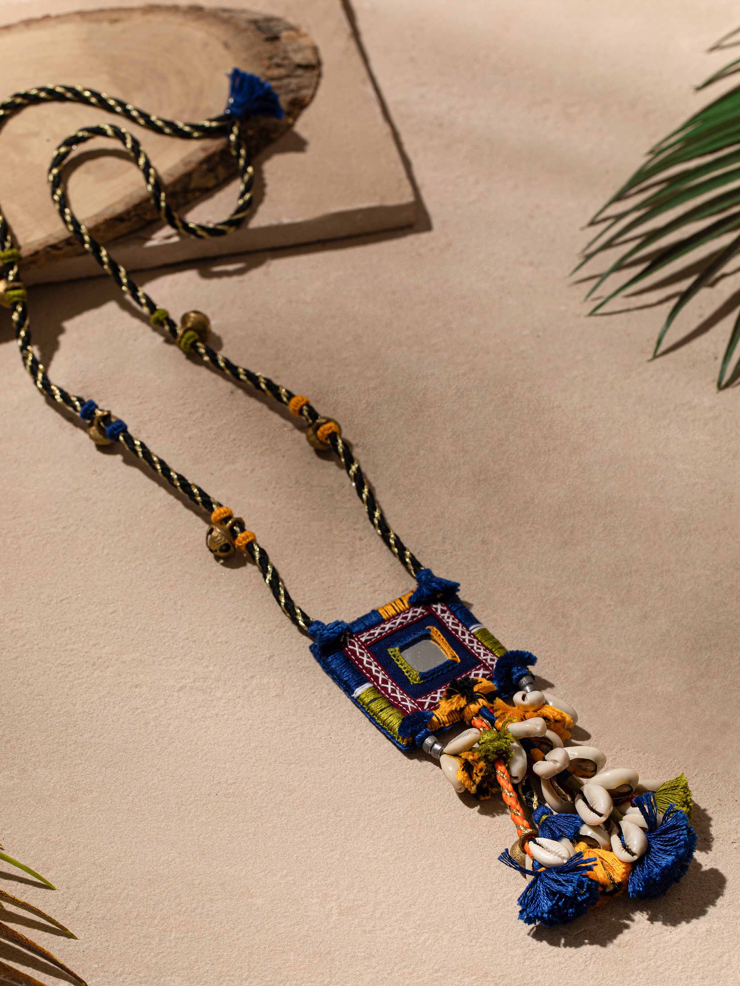 Side view of Banjara Embroidery long necklace showcasing detailed threadwork and unique design elements