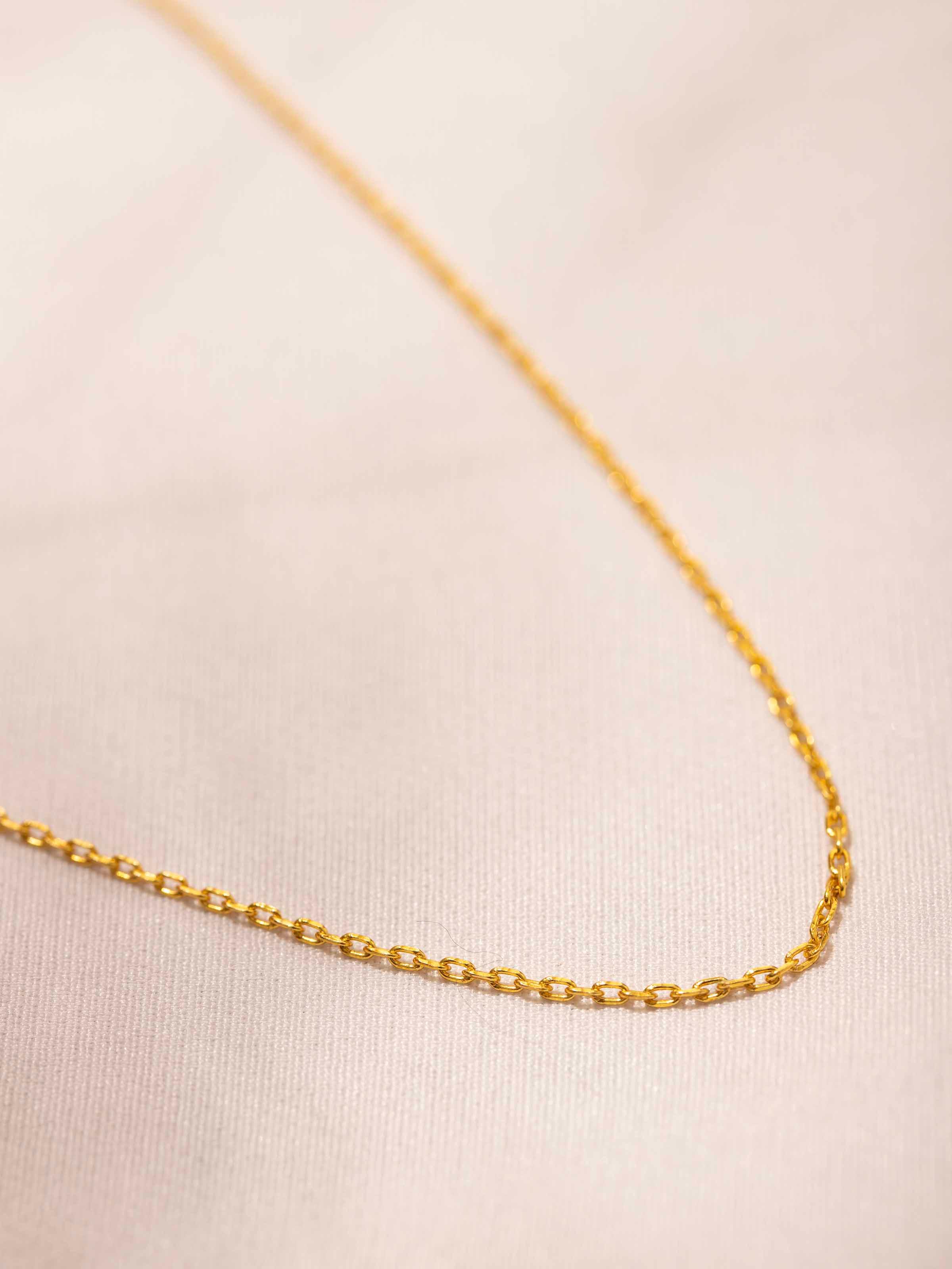 Detailed view of Silver Smithing Chain showcasing the polished silver links and sleek design