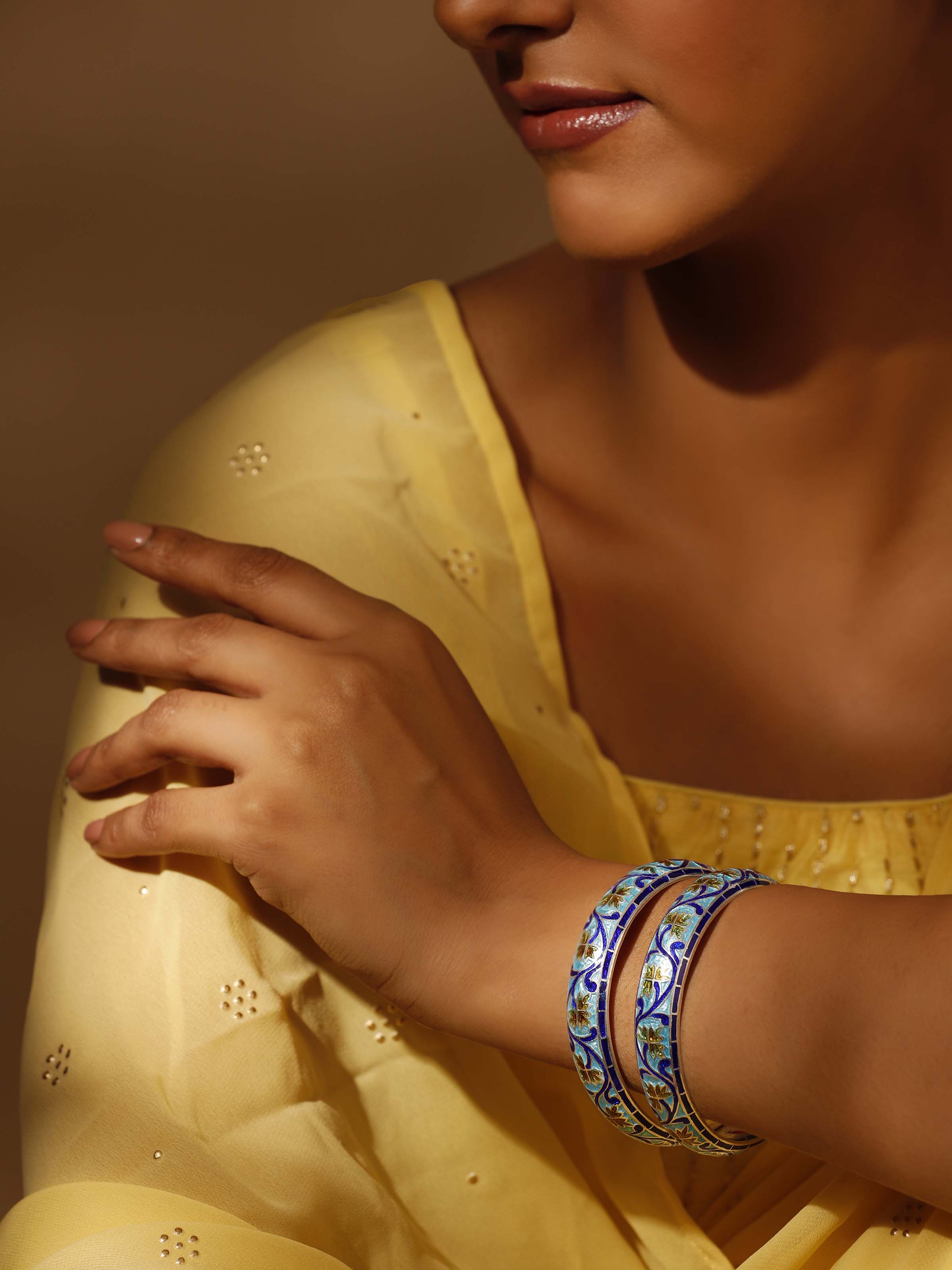 Side view of Blue Meenakari Silver Bangles highlighting detailed enamelwork and elegant curves