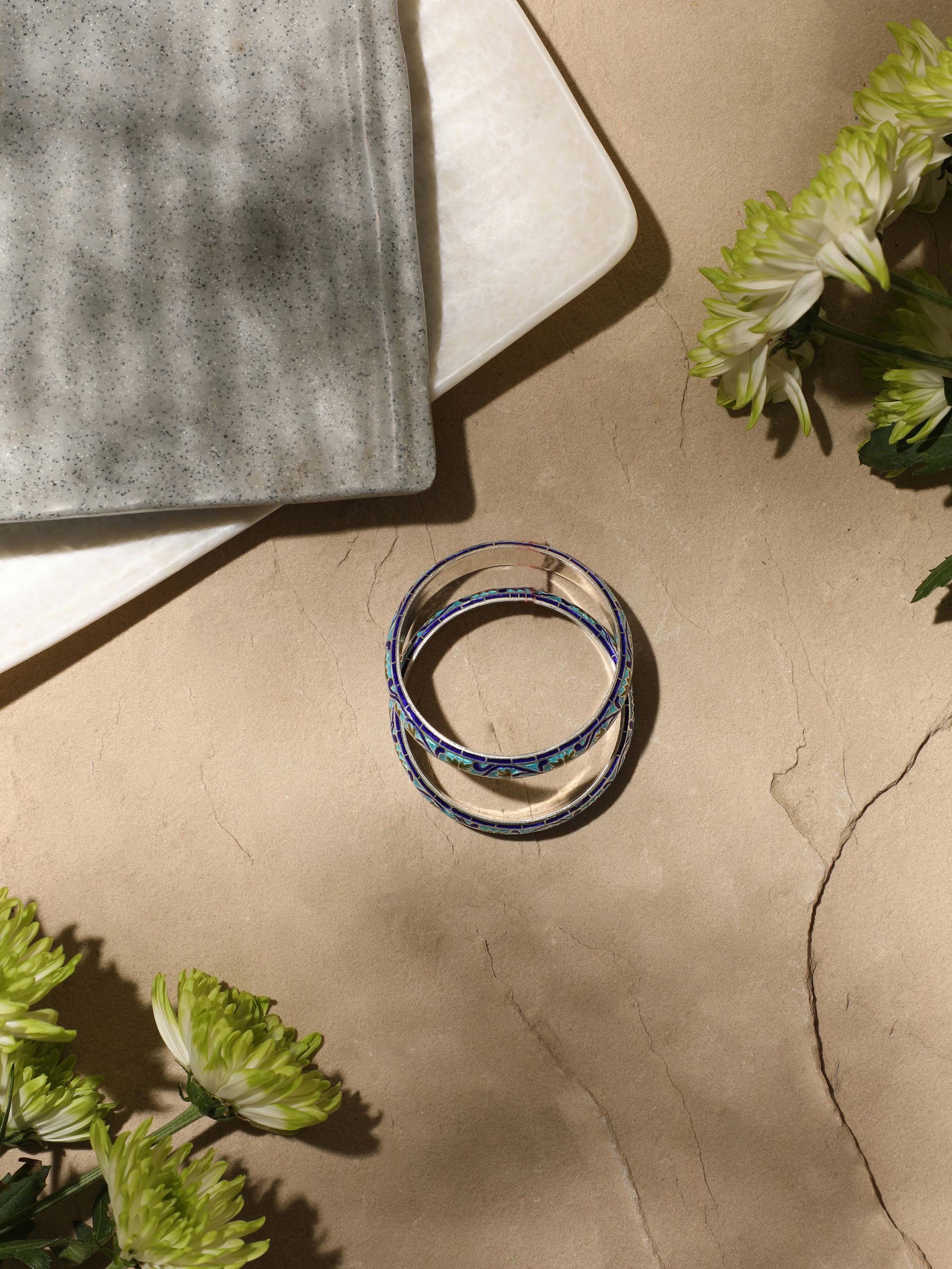 Angled view of Blue Meenakari Silver Bangles showcasing their elegant design and intricate enamelwork