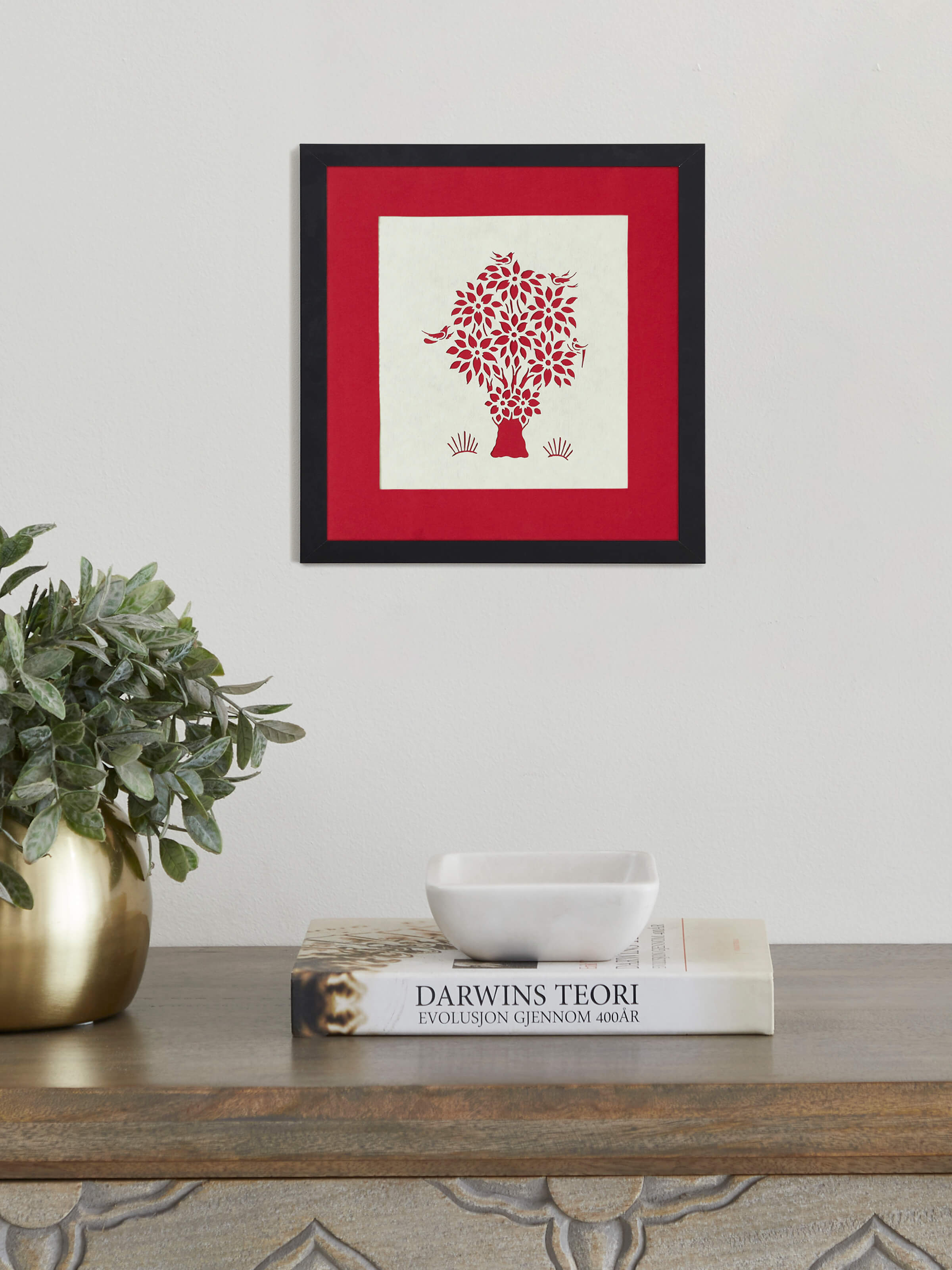 Close-up view of Sanjhi paper stencil small banyan tree wall art, showcasing detailed cut-out design and texture.