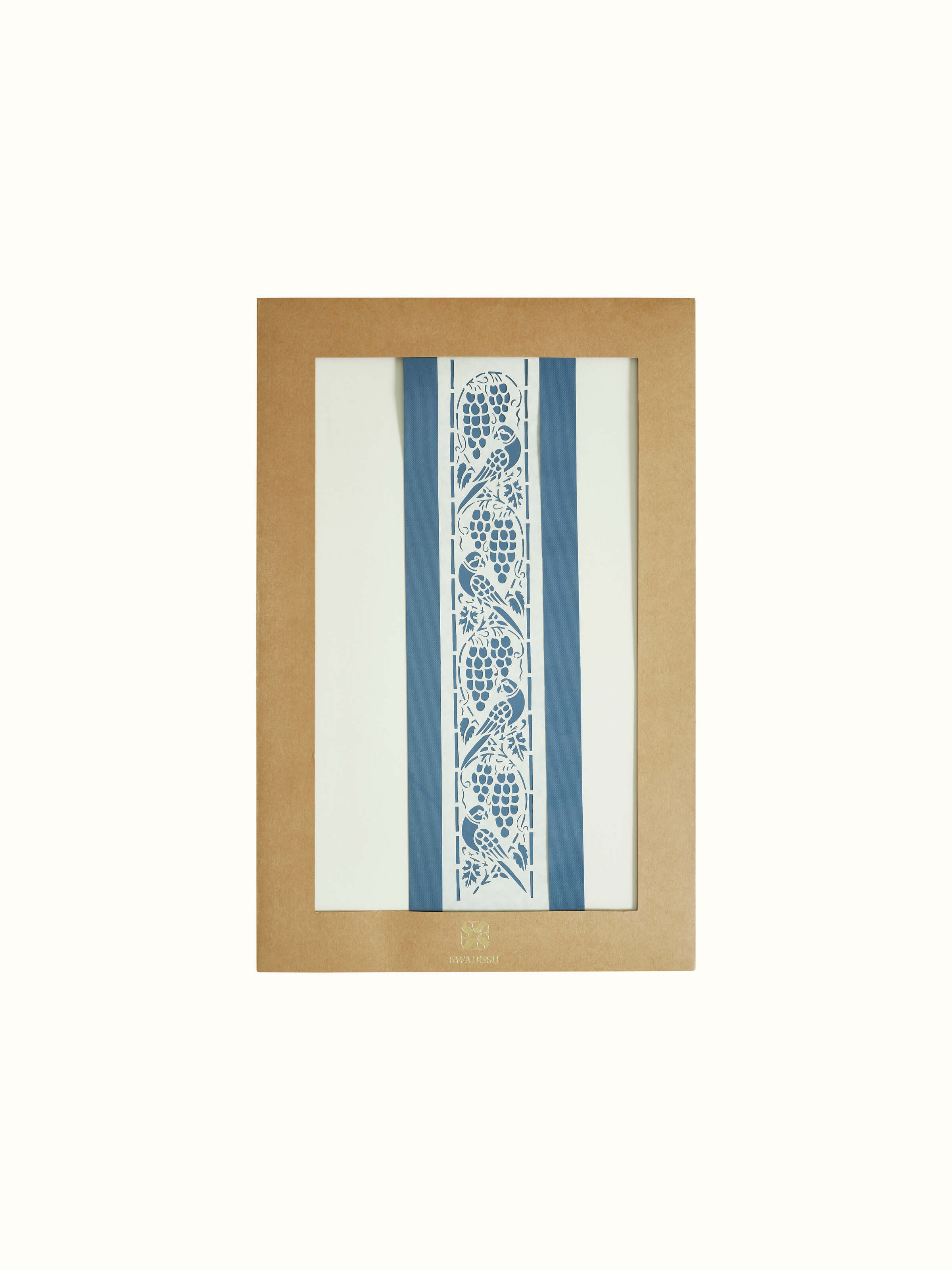 Side view of Sanjhi paper stencil parrot wall art, showing the depth and texture of the stencil design.