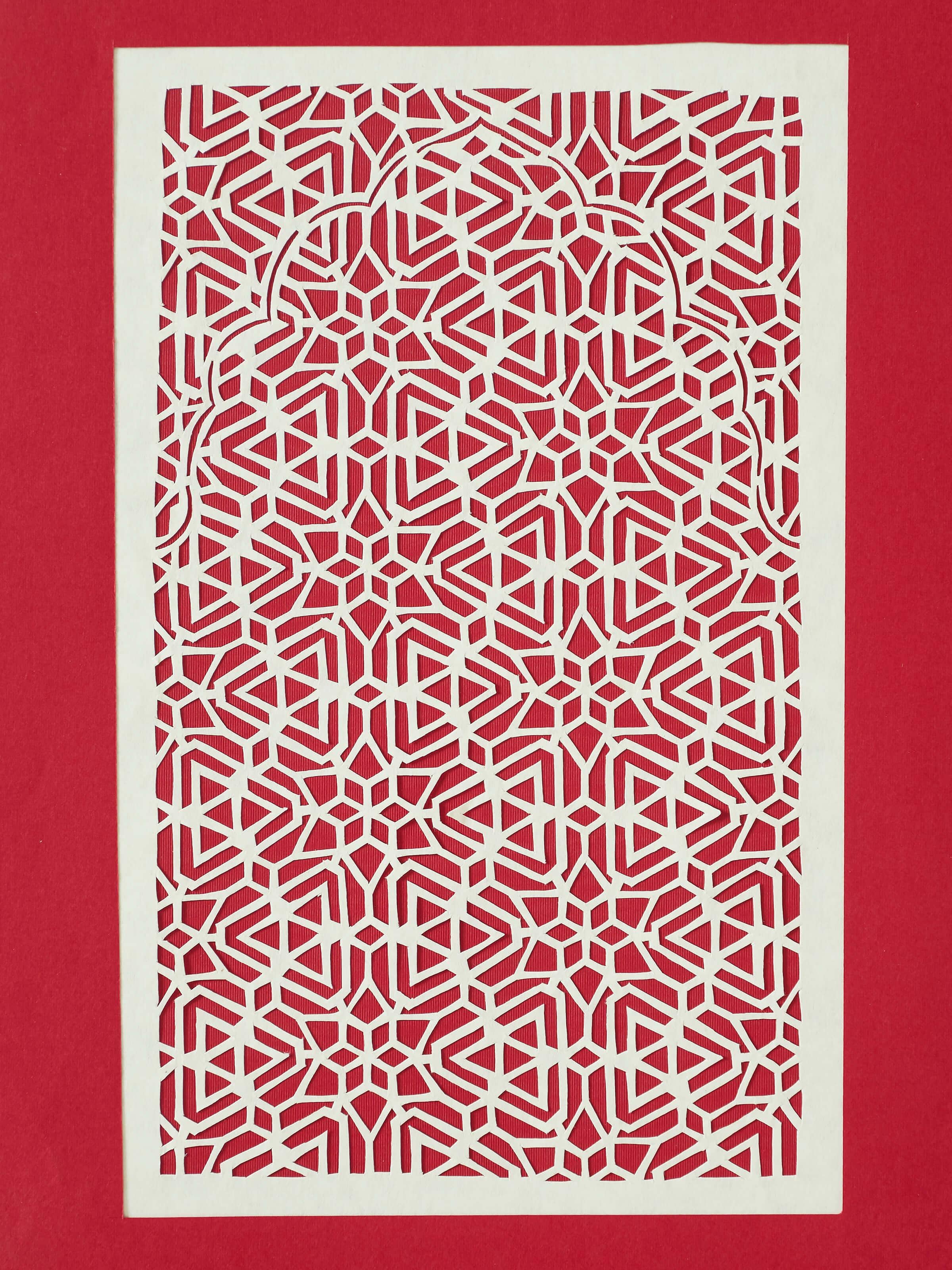 Side view of Sanjhi Paper Stencil Kata Jaali Wall Art, showing the depth and texture of the paper stencil design