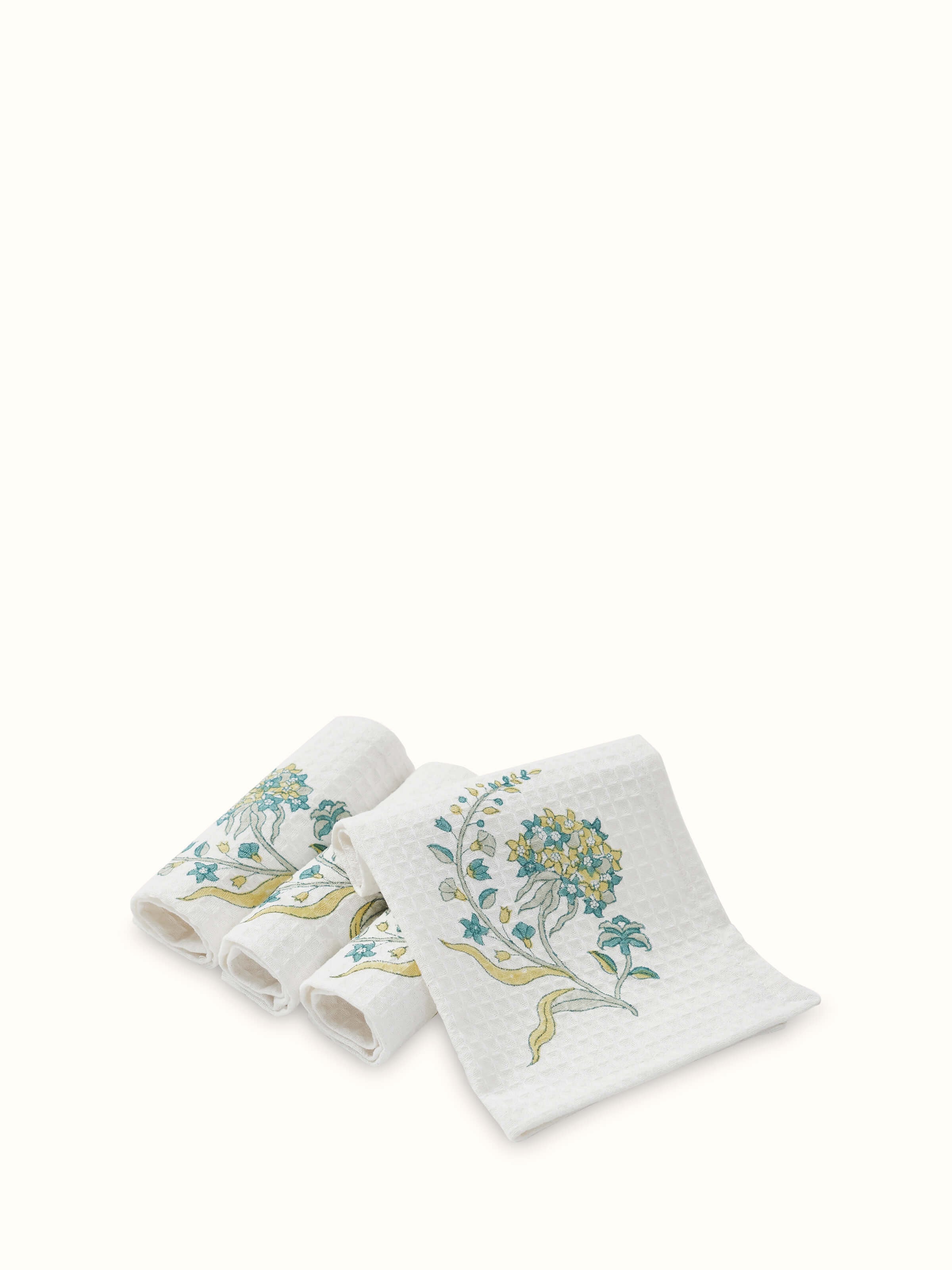 Full view of Palampore yellow floral cotton Sanganeri block printed face towels showing the vibrant floral pattern and set of 4