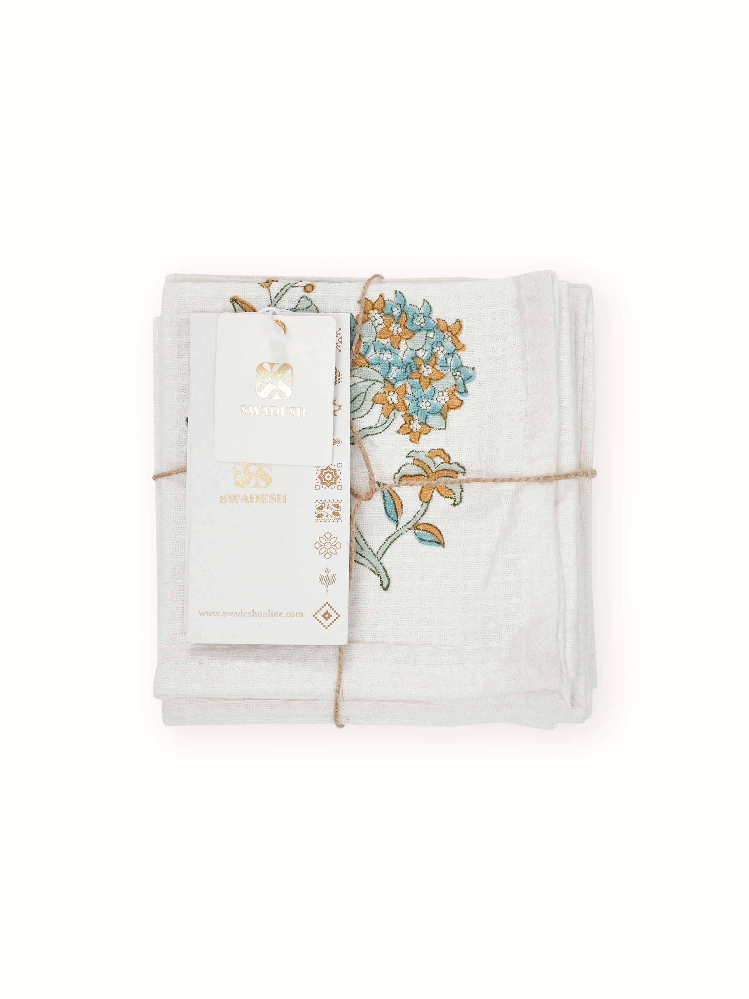 Palampore white floral cotton face towels set, showcasing the block print pattern and fabric quality.