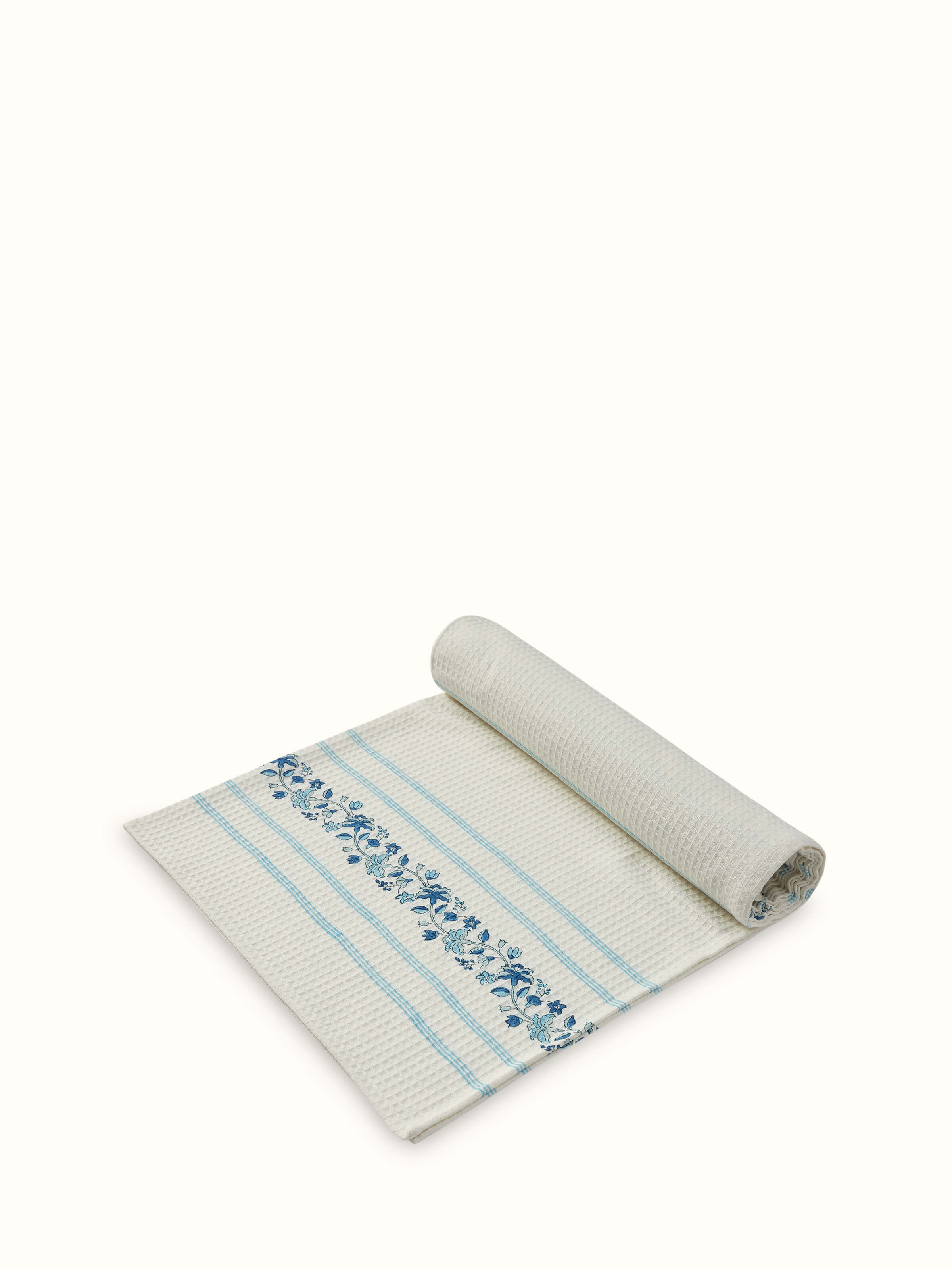 Palampore stripe blue floral cotton Sanganeri block printed bath towel (XL) in use, displaying its vibrant design