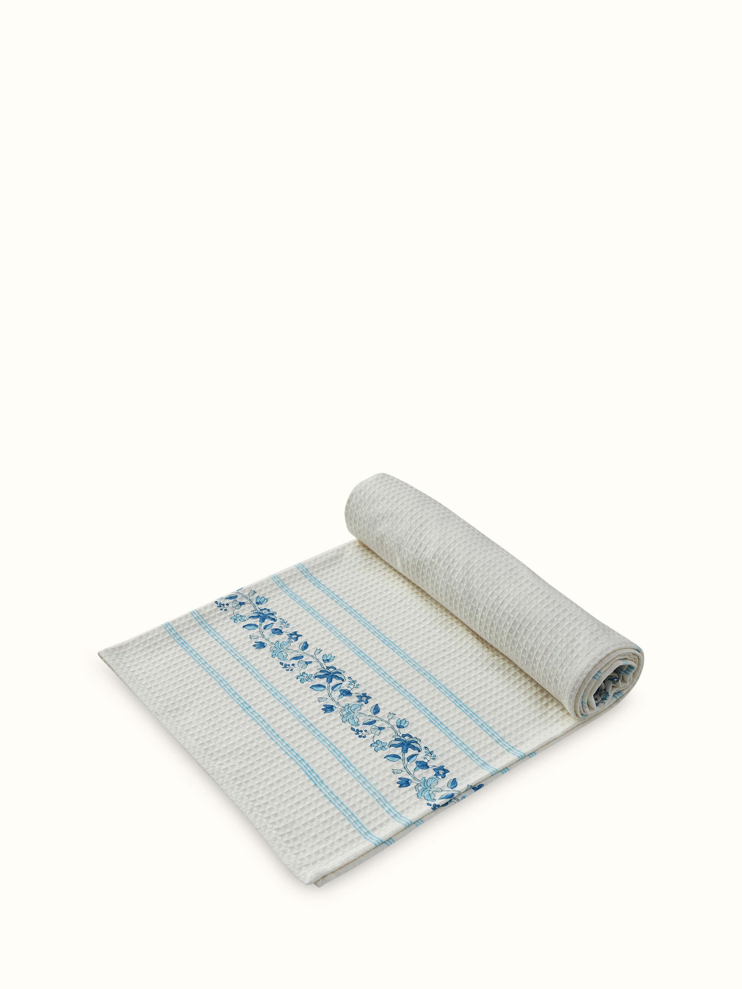 Detailed view of Palampore blue floral cotton bath towel showing the Sanganeri block print pattern