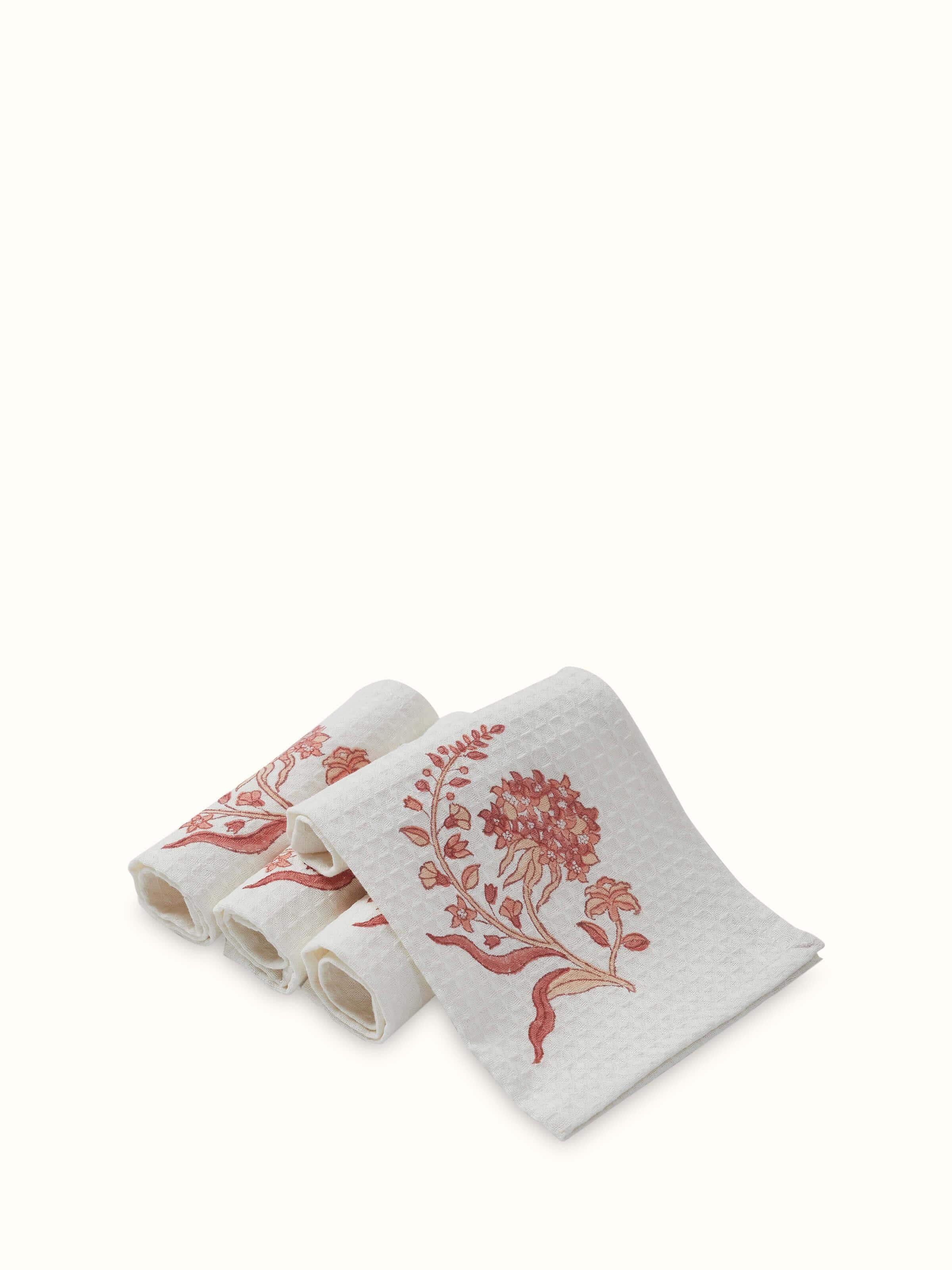 Set of Palampore peach floral cotton face towels with Sanganeri block print, showcasing the delicate peach floral design.