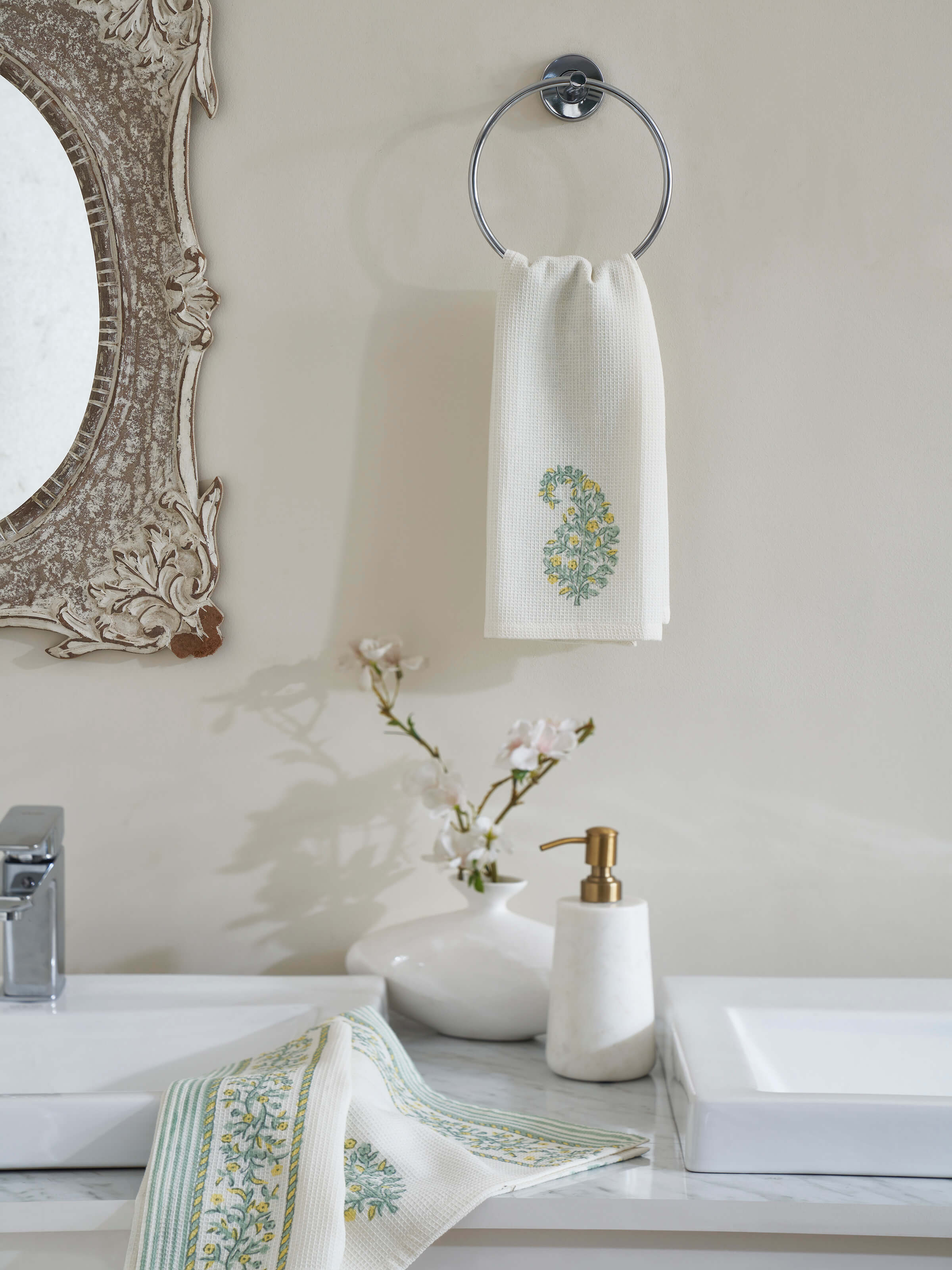 Angled view of Ambi stripe yellow floral cotton Sanganeri block printed hand towels (2 pcs) highlighting the pattern and texture