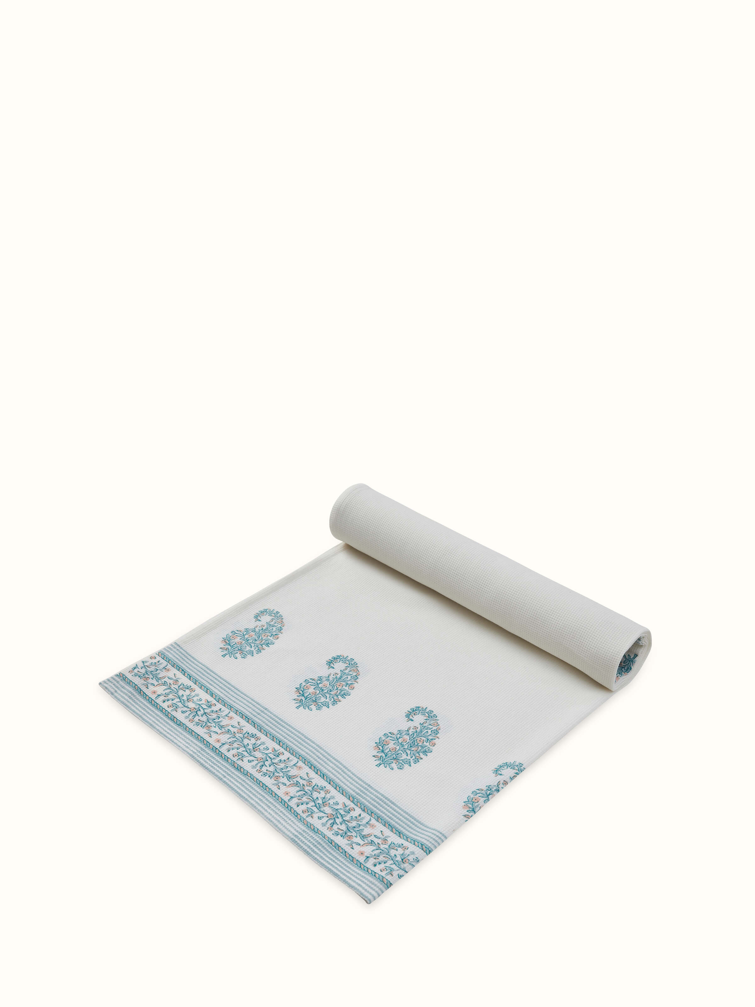 Detailed view of the Ambi border blue floral cotton Sanganeri block printed bath towel (XL), focusing on the fabric weave.