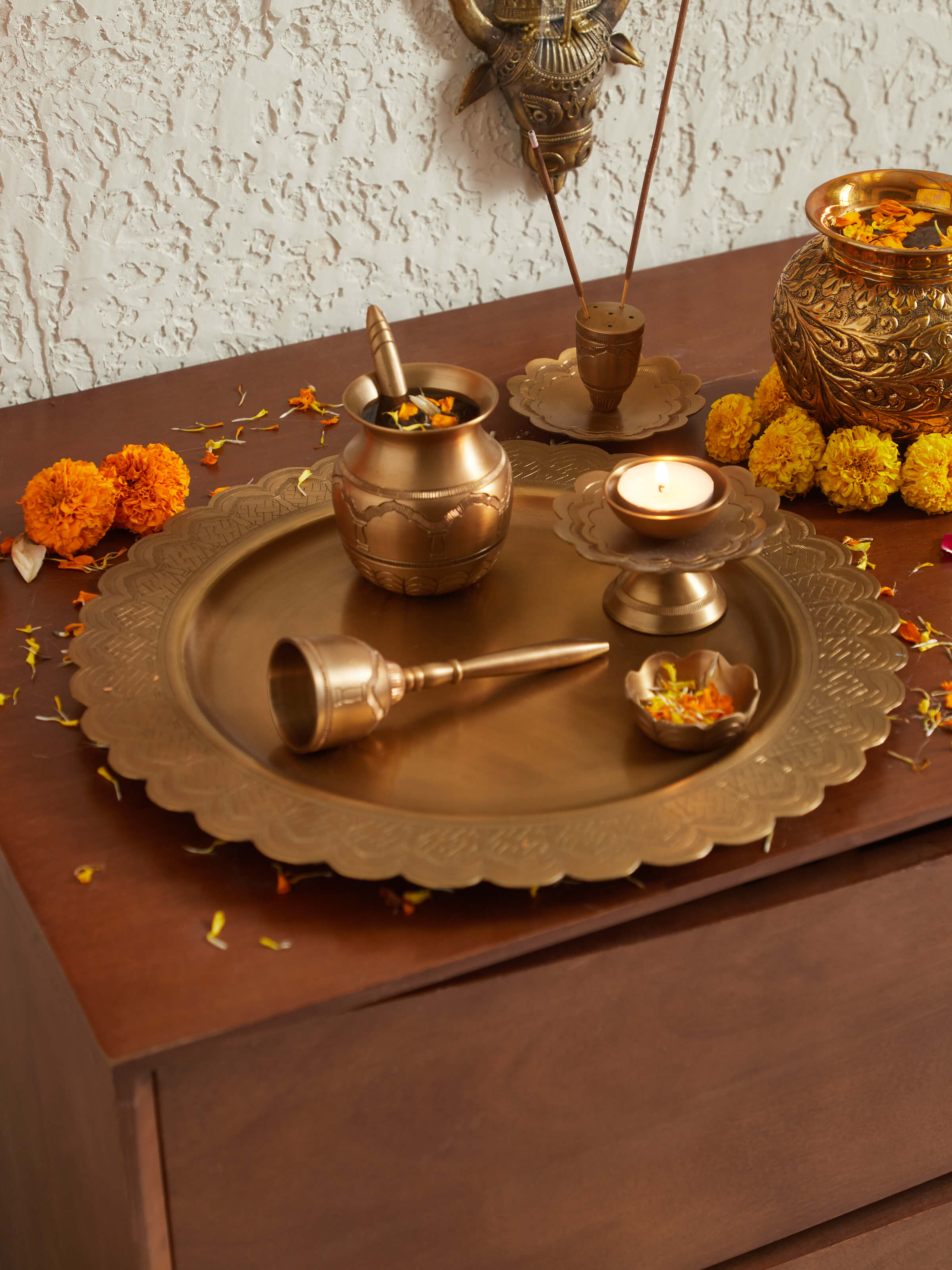 Side view of Polished Brass Pooja Thali Set highlighting its intricate details and finish